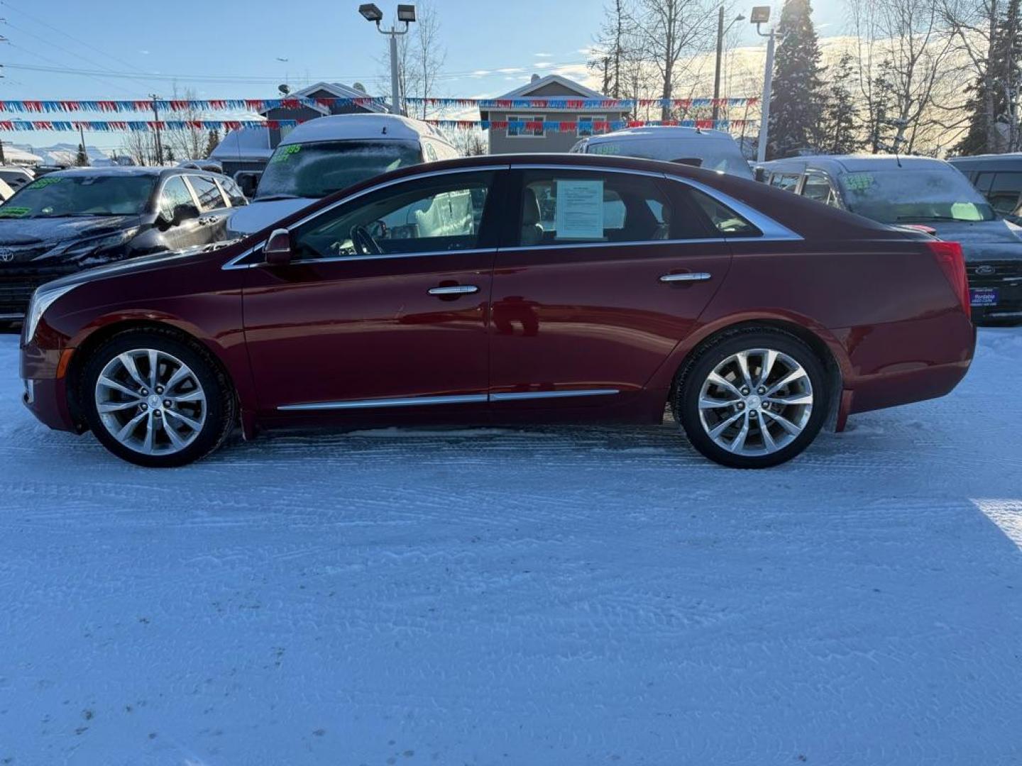 2016 MAROON CADILLAC XTS PREMIUM COLLECTION (2G61R5S37G9) with an 3.6L engine, Automatic transmission, located at 929 East 8th Ave, Anchorage, AK, 99501, (907) 274-2277, 61.214783, -149.866074 - Photo#1