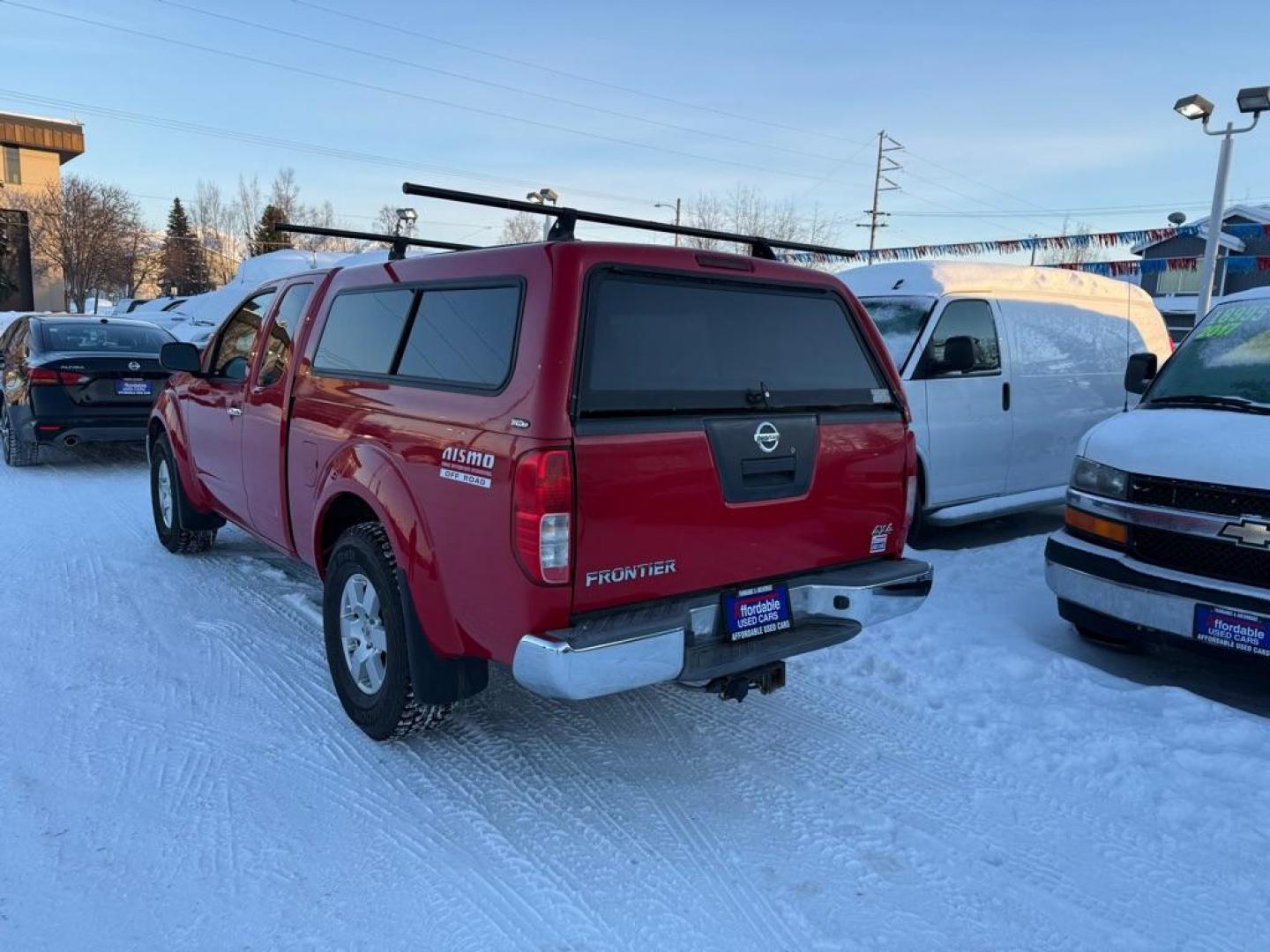 2008 RED NISSAN FRONTIER KING CAB LE (1N6AD06W18C) with an 4.0L engine, 5-Speed Manual transmission, located at 929 East 8th Ave, Anchorage, AK, 99501, (907) 274-2277, 61.214783, -149.866074 - Photo#2