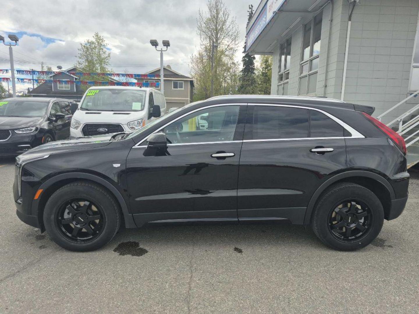 2025 BLACK CADILLAC XT4 PREMIUM LUXURY (1GYFZDR48SF) with an 2.0L engine, Automatic transmission, located at 929 East 8th Ave, Anchorage, AK, 99501, (907) 274-2277, 61.214783, -149.866074 - Photo#1