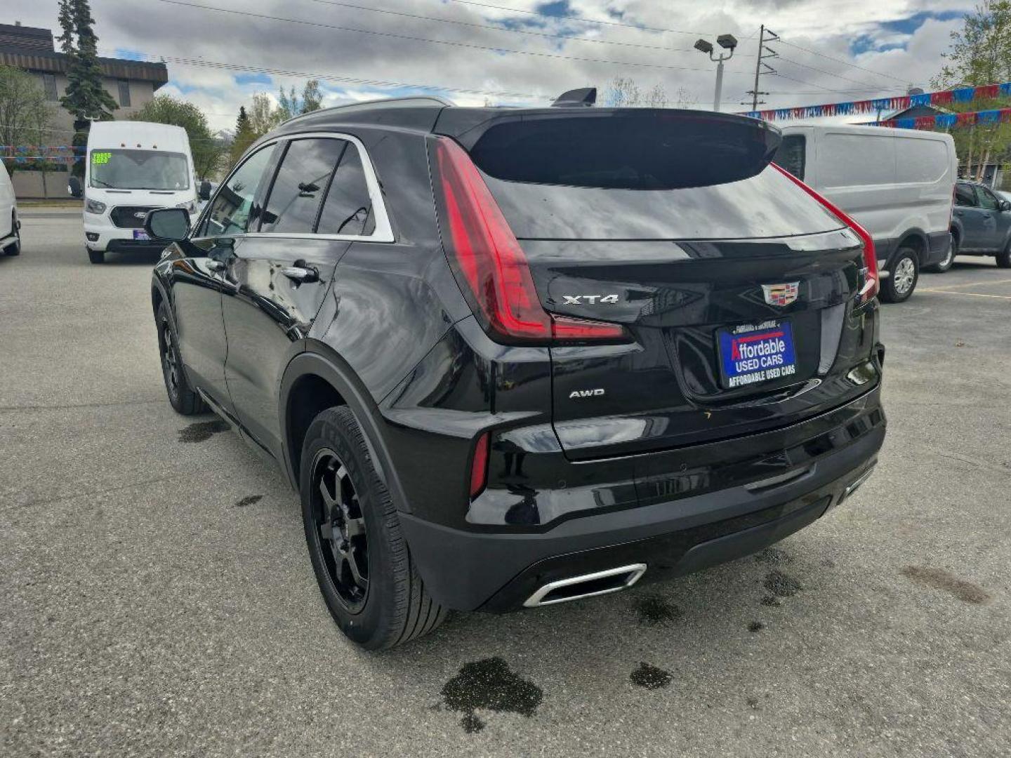 2025 BLACK CADILLAC XT4 PREMIUM LUXURY (1GYFZDR48SF) with an 2.0L engine, Automatic transmission, located at 929 East 8th Ave, Anchorage, AK, 99501, (907) 274-2277, 61.214783, -149.866074 - Photo#2