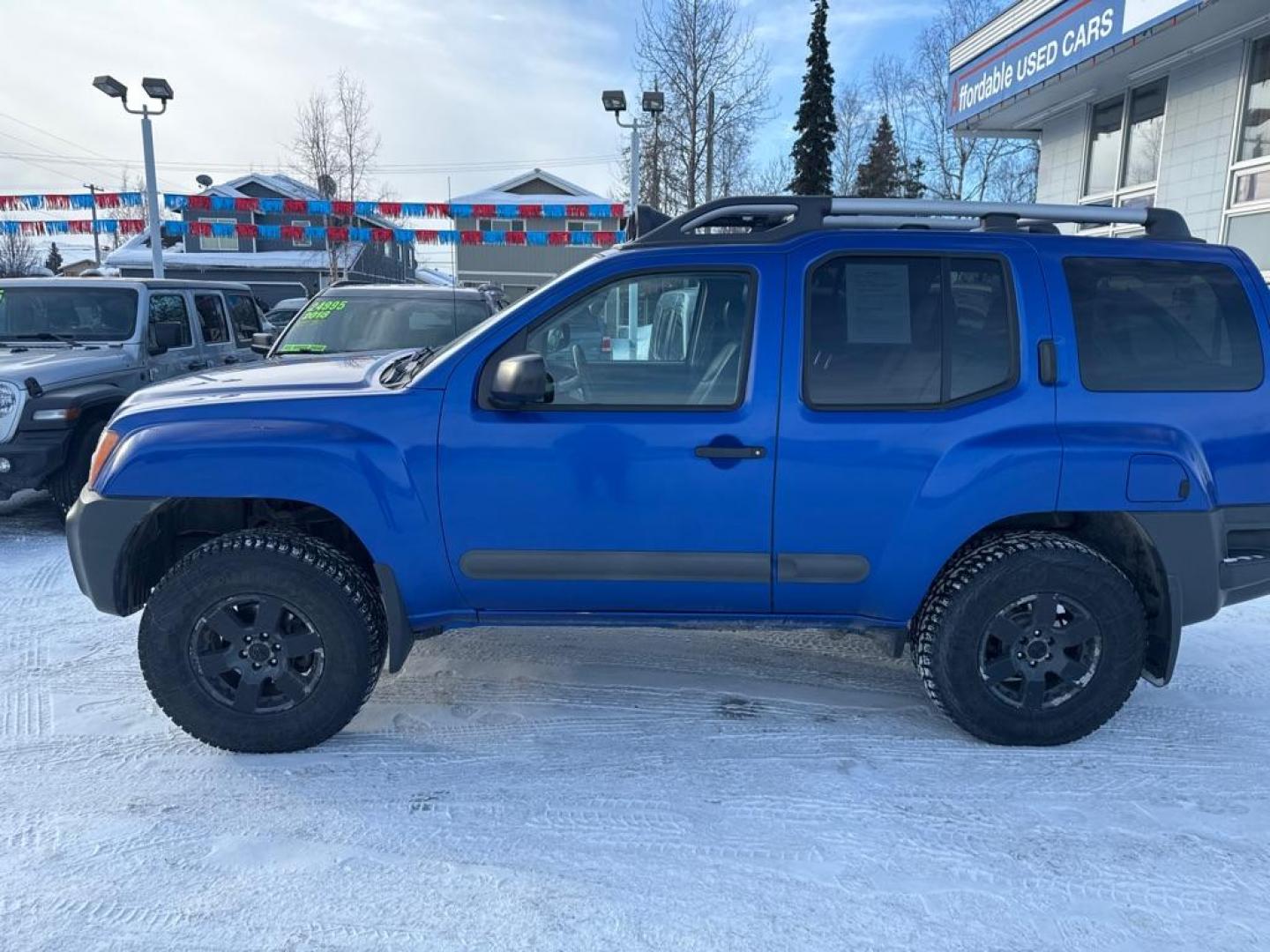 2012 BLUE NISSAN XTERRA OFF ROAD (5N1AN0NW2CC) with an 4.0L engine, Automatic transmission, located at 929 East 8th Ave, Anchorage, AK, 99501, (907) 274-2277, 61.214783, -149.866074 - Photo#1