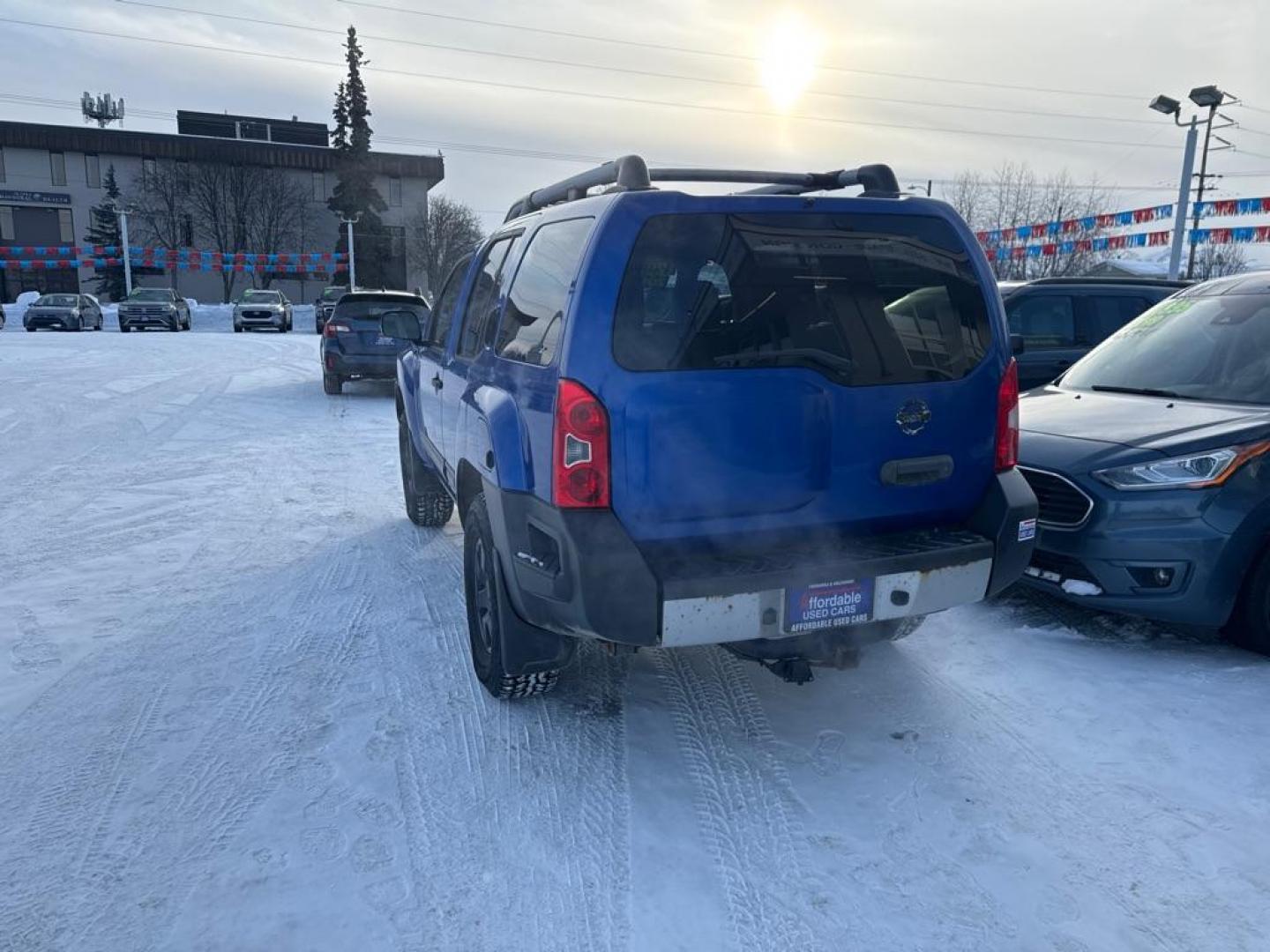 2012 BLUE NISSAN XTERRA OFF ROAD (5N1AN0NW2CC) with an 4.0L engine, Automatic transmission, located at 929 East 8th Ave, Anchorage, AK, 99501, (907) 274-2277, 61.214783, -149.866074 - Photo#2