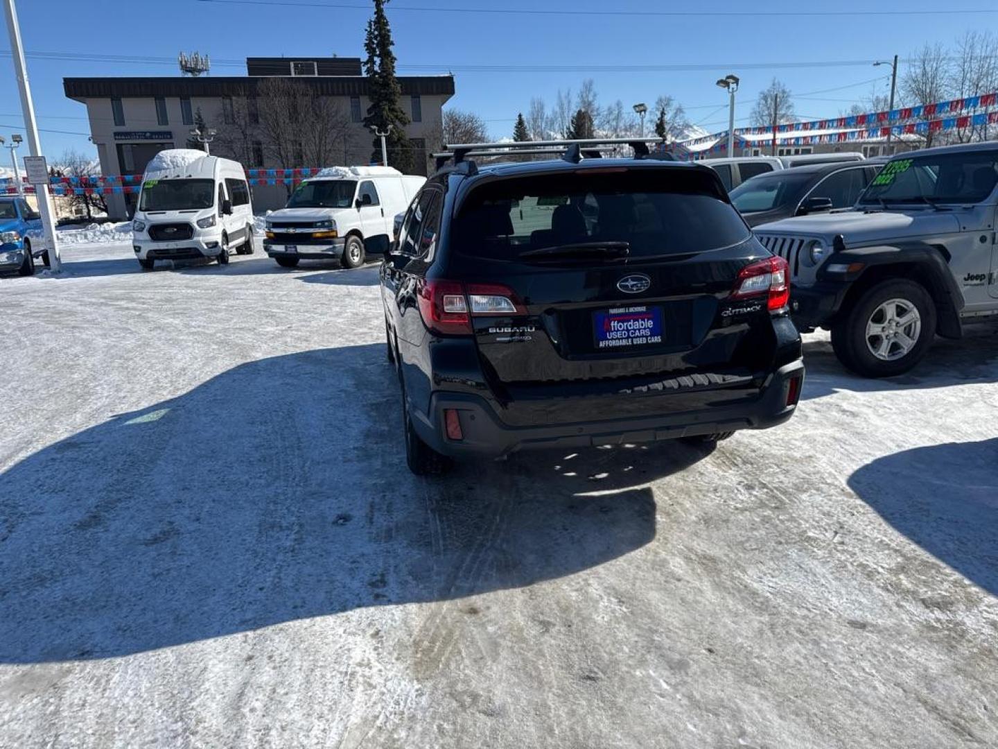 2019 BLACK SUBARU OUTBACK TOURING (4S4BSATC2K3) with an 2.5L engine, Continuously Variable transmission, located at 929 East 8th Ave, Anchorage, AK, 99501, (907) 274-2277, 61.214783, -149.866074 - Photo#2
