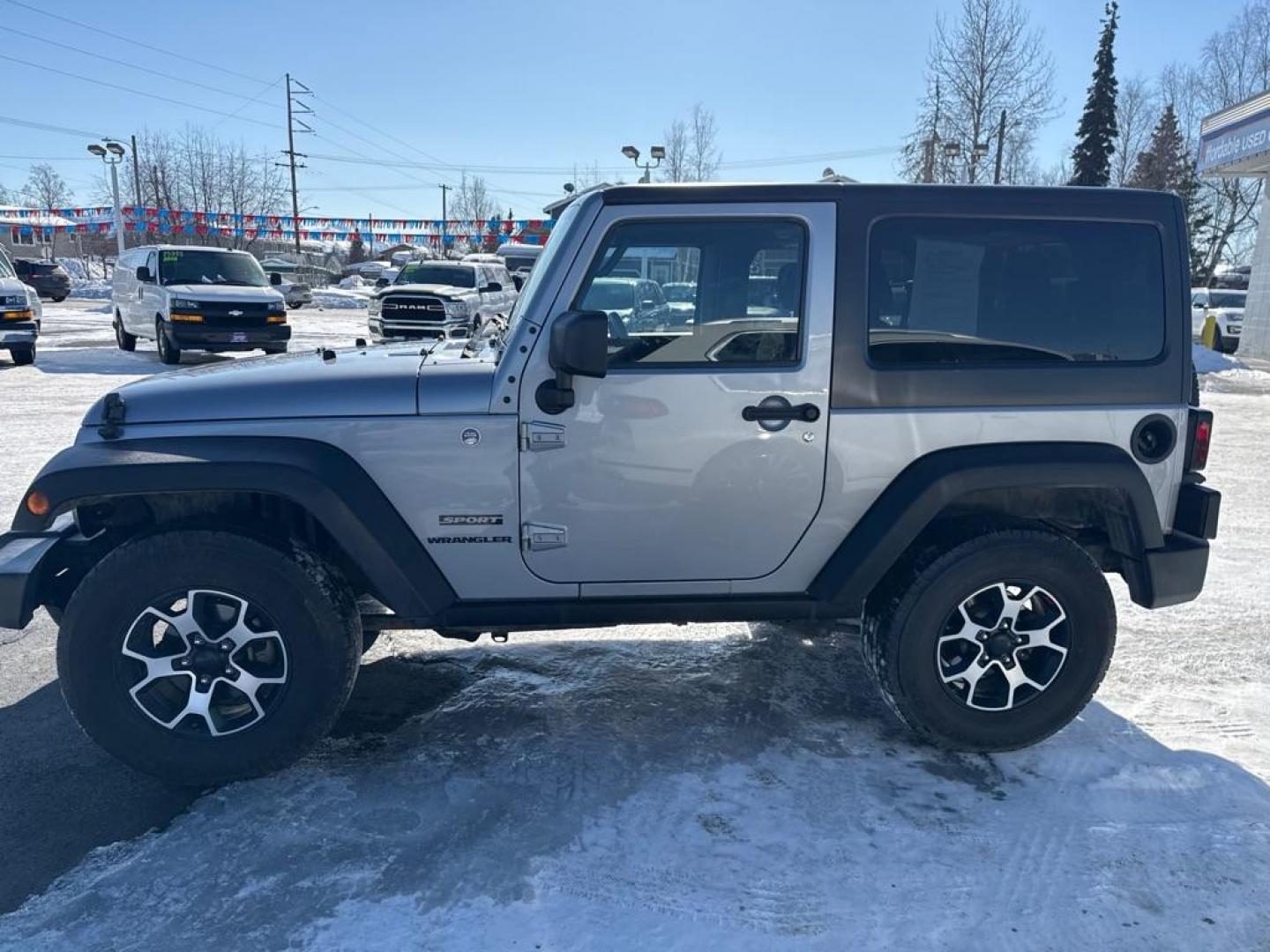 2015 SILVER JEEP WRANGLER SPORT (1C4AJWAG7FL) with an 3.6L engine, Automatic transmission, located at 929 East 8th Ave, Anchorage, AK, 99501, (907) 274-2277, 61.214783, -149.866074 - Photo#1