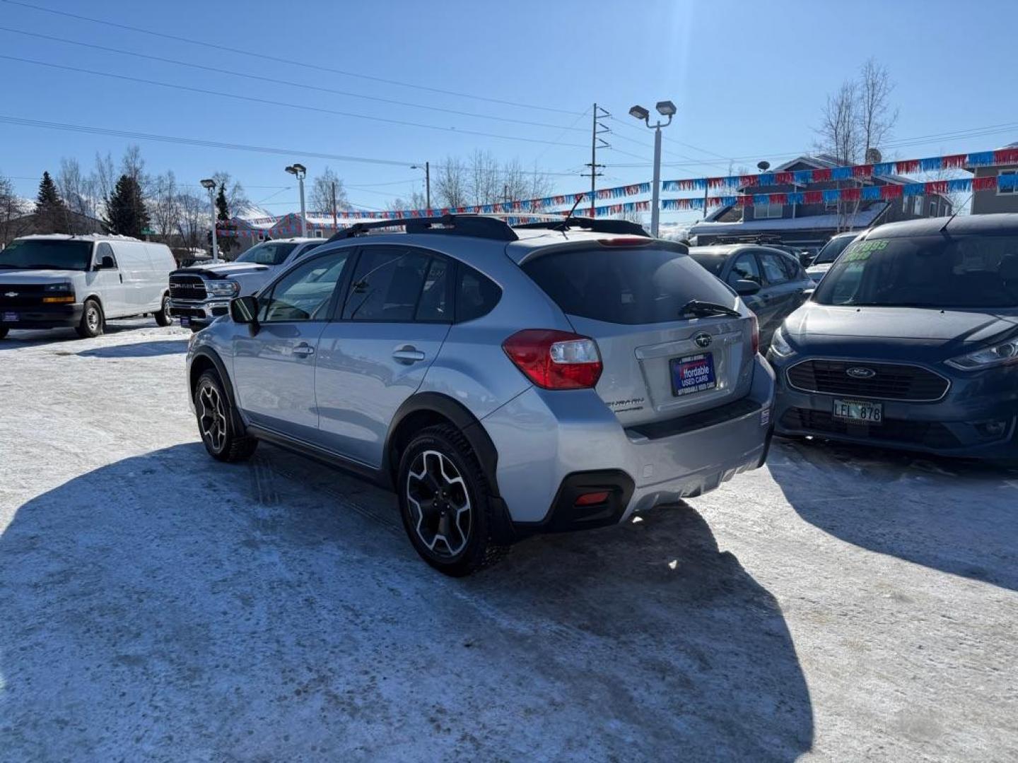 2013 BLUE SUBARU XV CROSSTREK 2.0 PREMIUM (JF2GPACC0D2) with an 2.0L engine, Continuously Variable transmission, located at 929 East 8th Ave, Anchorage, AK, 99501, (907) 274-2277, 61.214783, -149.866074 - Photo#2