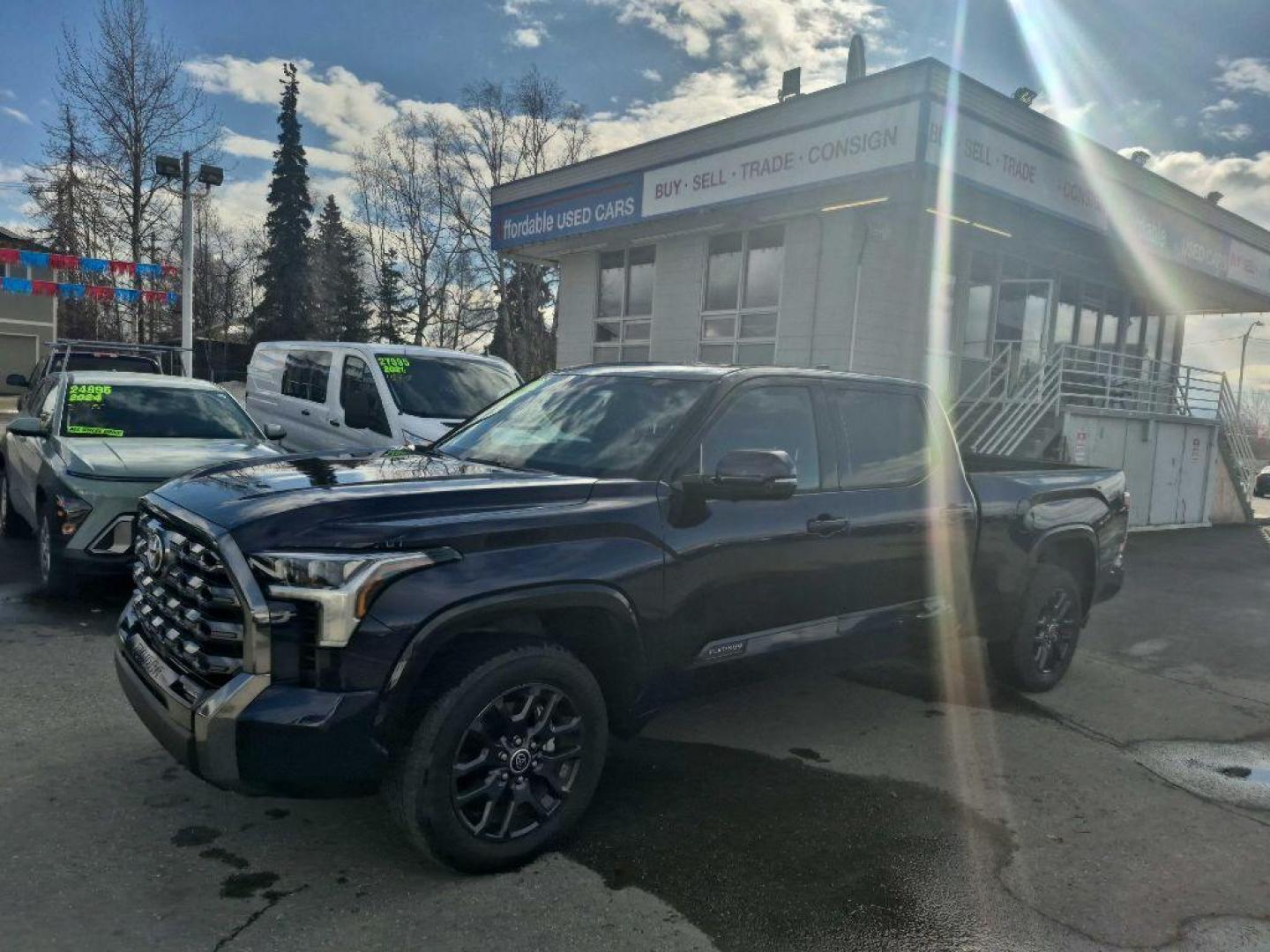 2023 BLUE TOYOTA TUNDRA CREWMAX PLATINUM (5TFNA5EC9PX) with an 3.4L engine, Automatic transmission, located at 929 East 8th Ave, Anchorage, AK, 99501, (907) 274-2277, 61.214783, -149.866074 - Photo#1