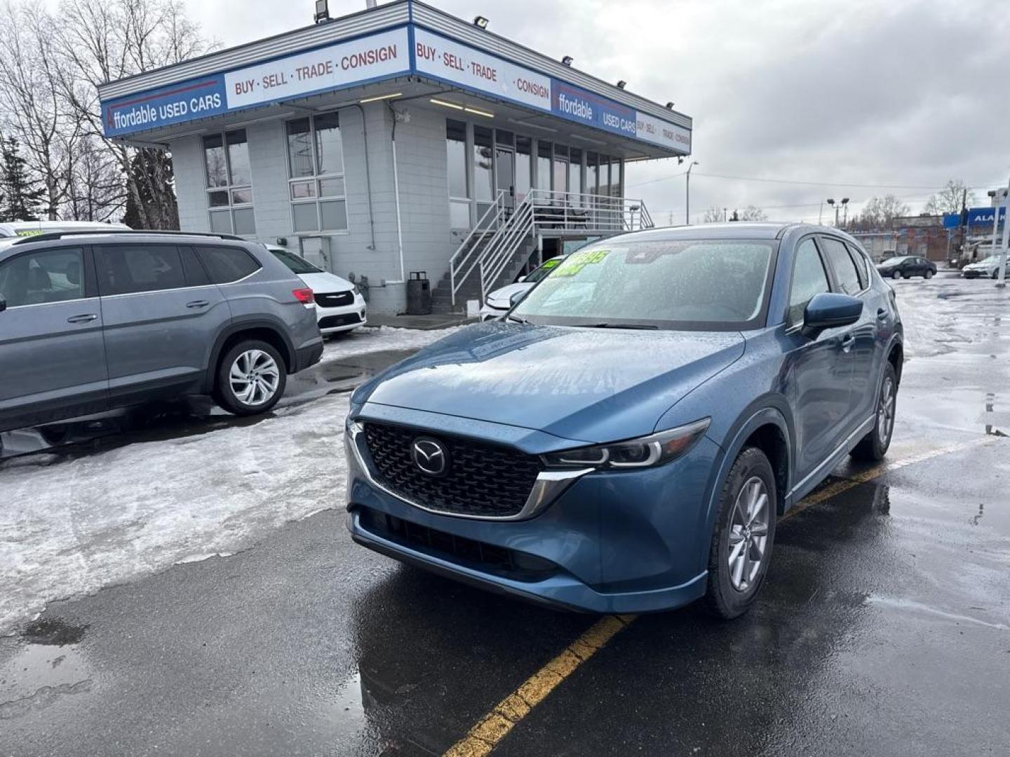 2024 BLUE MAZDA CX-5 SELECT (JM3KFBBL2R0) with an 2.5L engine, Automatic transmission, located at 929 East 8th Ave, Anchorage, AK, 99501, (907) 274-2277, 61.214783, -149.866074 - Photo#0