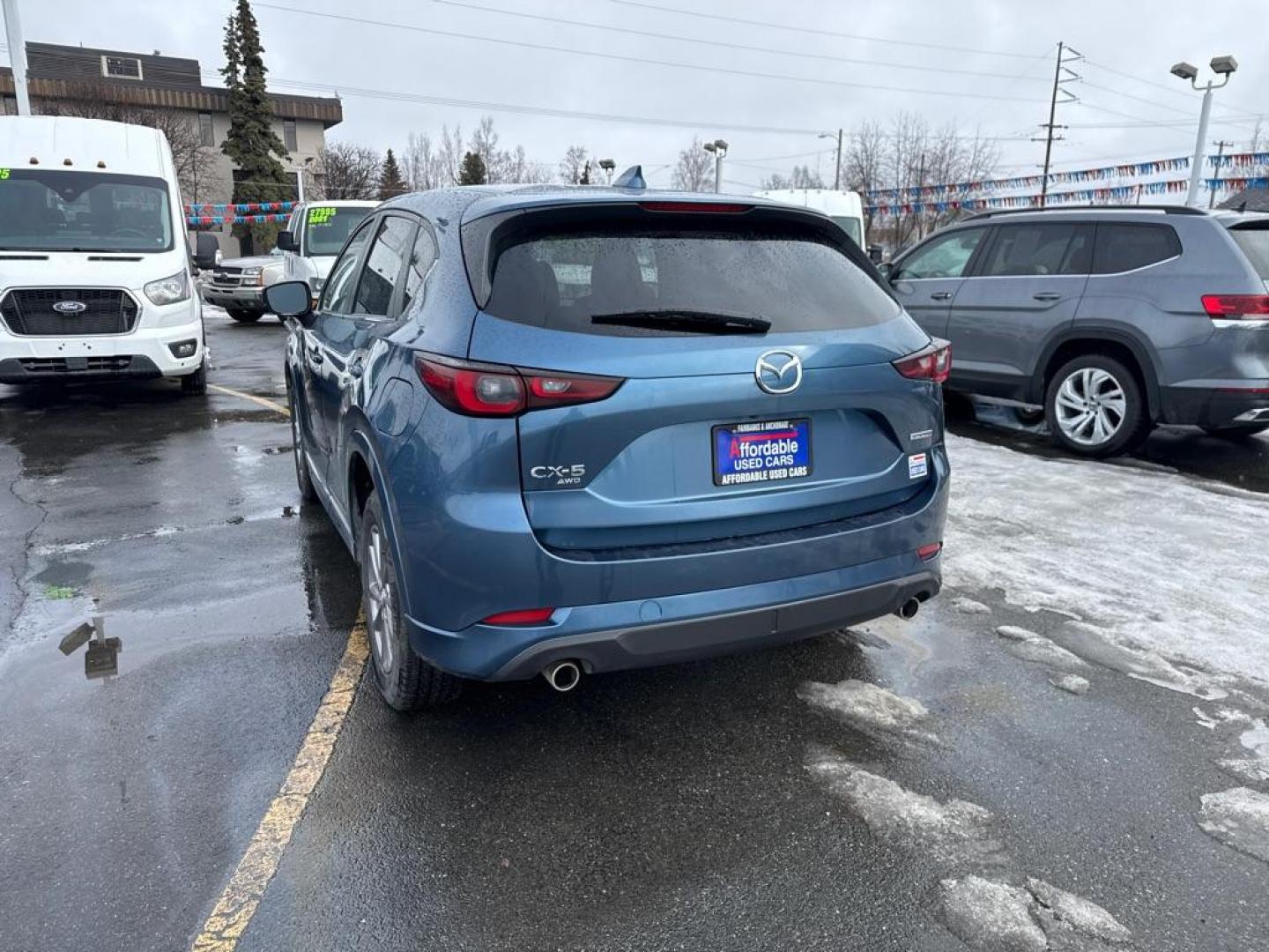 2024 BLUE MAZDA CX-5 SELECT (JM3KFBBL2R0) with an 2.5L engine, Automatic transmission, located at 929 East 8th Ave, Anchorage, AK, 99501, (907) 274-2277, 61.214783, -149.866074 - Photo#2
