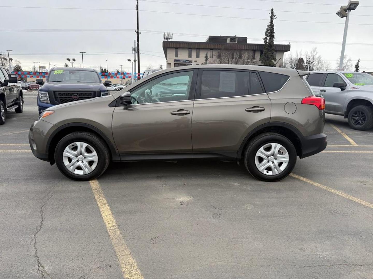 2015 BROWN TOYOTA RAV4 LE (2T3BFREVXFW) with an 2.5L engine, Automatic transmission, located at 929 East 8th Ave, Anchorage, AK, 99501, (907) 274-2277, 61.214783, -149.866074 - Photo#1