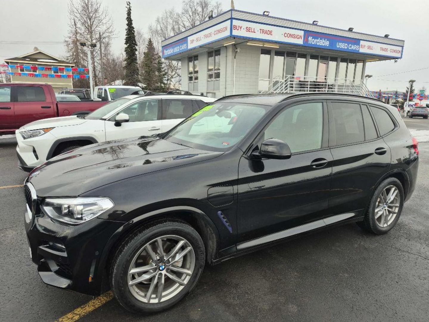 2021 BLACK BMW X3 XDRIVE30E (5UXTS1C09M9) with an 2.0L engine, Automatic transmission, located at 929 East 8th Ave, Anchorage, AK, 99501, (907) 274-2277, 61.214783, -149.866074 - Photo#1