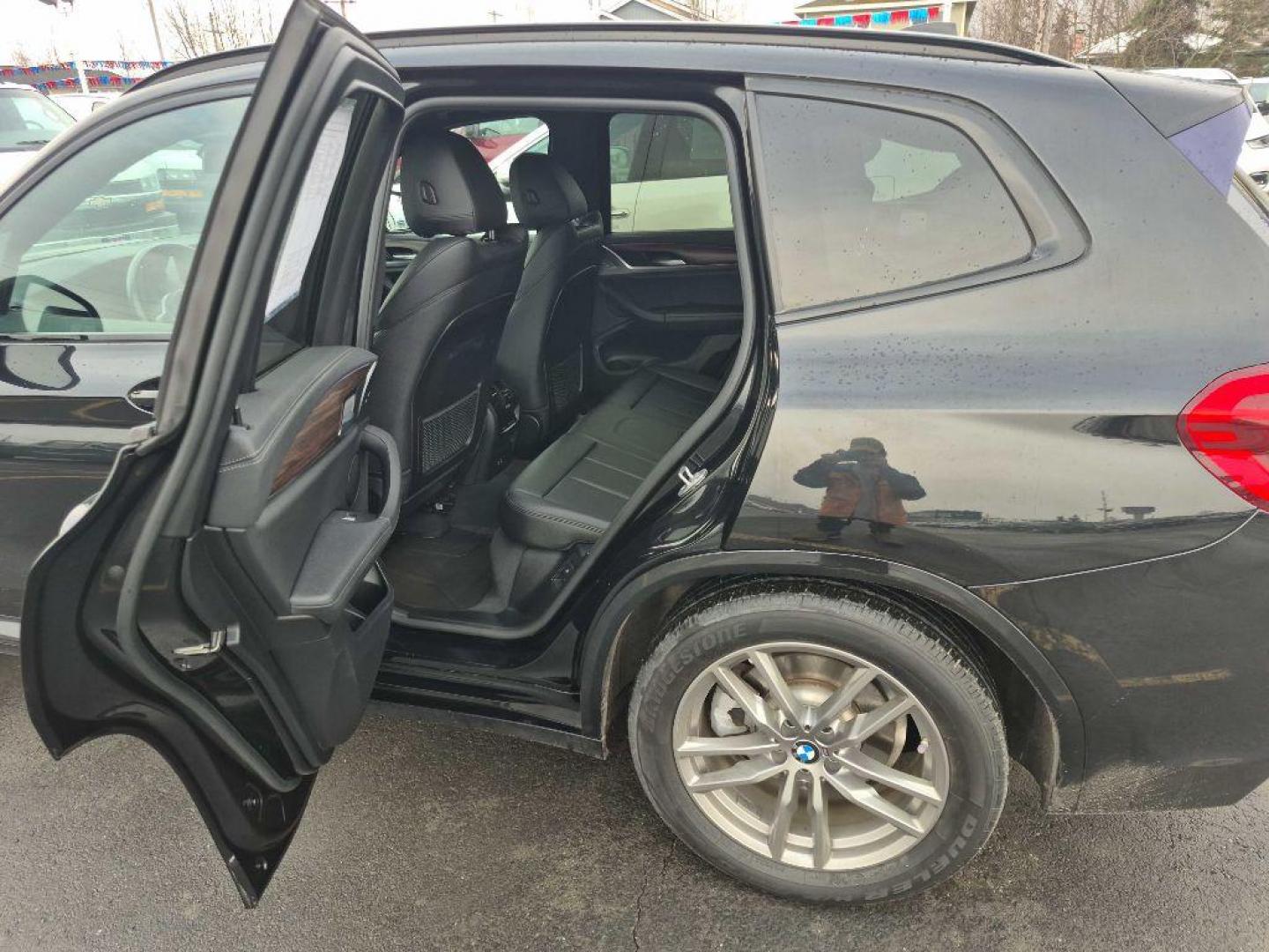 2021 BLACK BMW X3 XDRIVE30E (5UXTS1C09M9) with an 2.0L engine, Automatic transmission, located at 929 East 8th Ave, Anchorage, AK, 99501, (907) 274-2277, 61.214783, -149.866074 - Photo#2