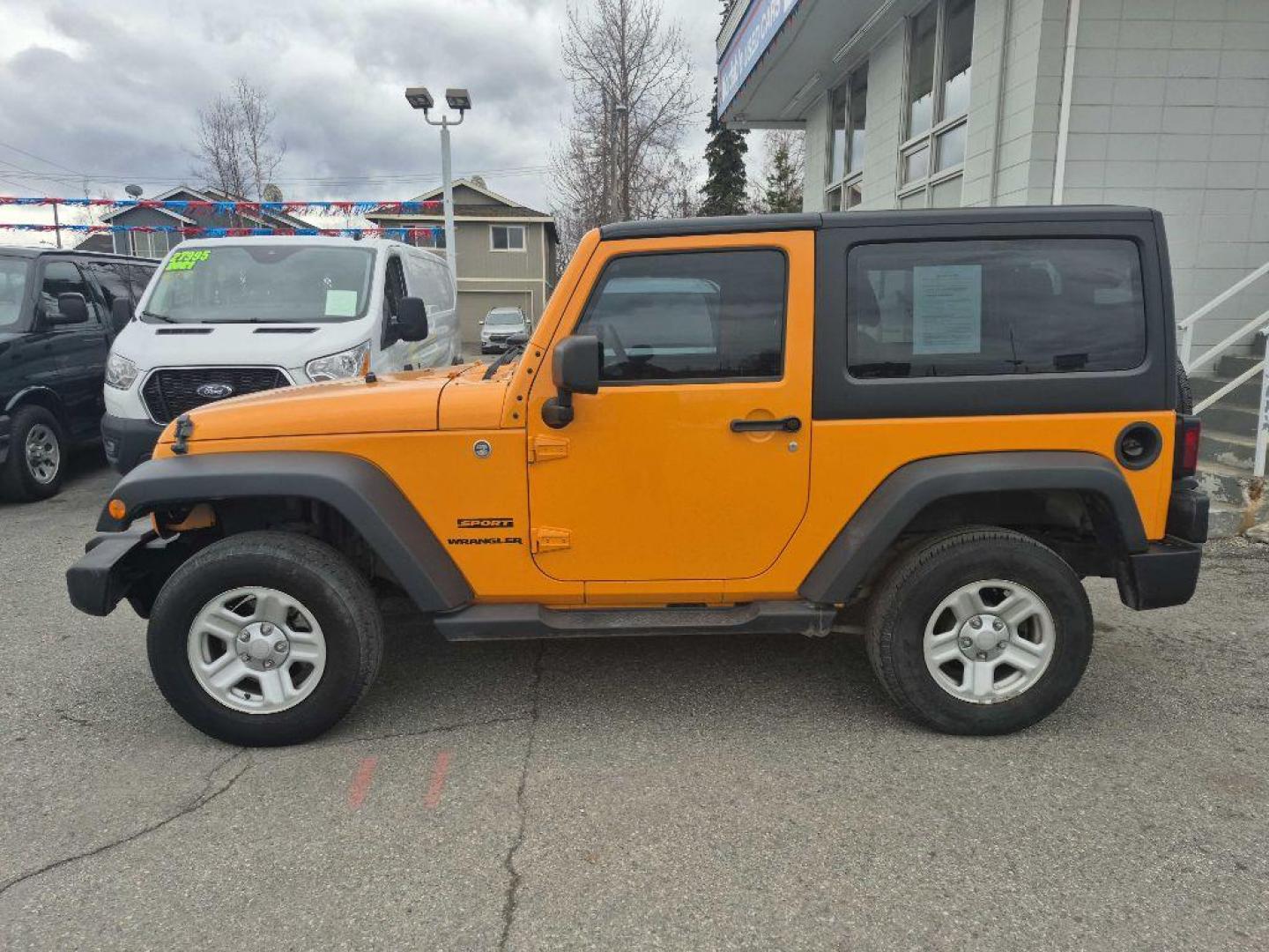 2012 ORANGE JEEP WRANGLER SPORT (1C4AJWAGXCL) with an 3.6L engine, Automatic transmission, located at 929 East 8th Ave, Anchorage, AK, 99501, (907) 274-2277, 61.214783, -149.866074 - Photo#1