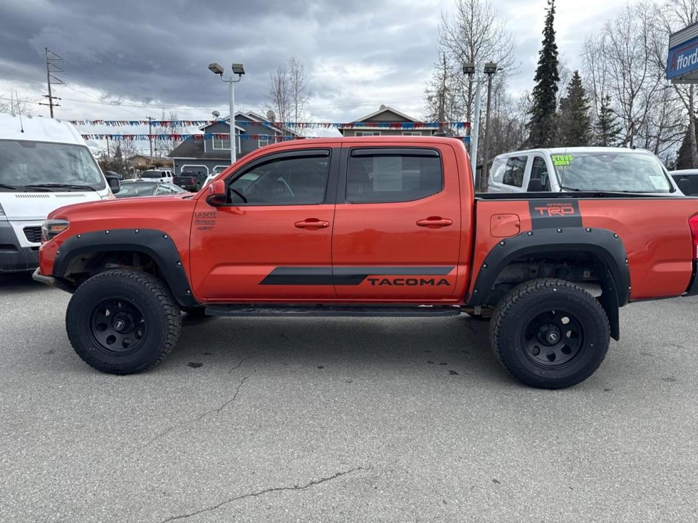 2017 ORANGE TOYOTA TACOMA DOUBLE CAB (5TFCZ5AN9HX) with an 3.5L engine, Automatic transmission, located at 929 East 8th Ave, Anchorage, AK, 99501, (907) 274-2277, 61.214783, -149.866074 - Photo#1