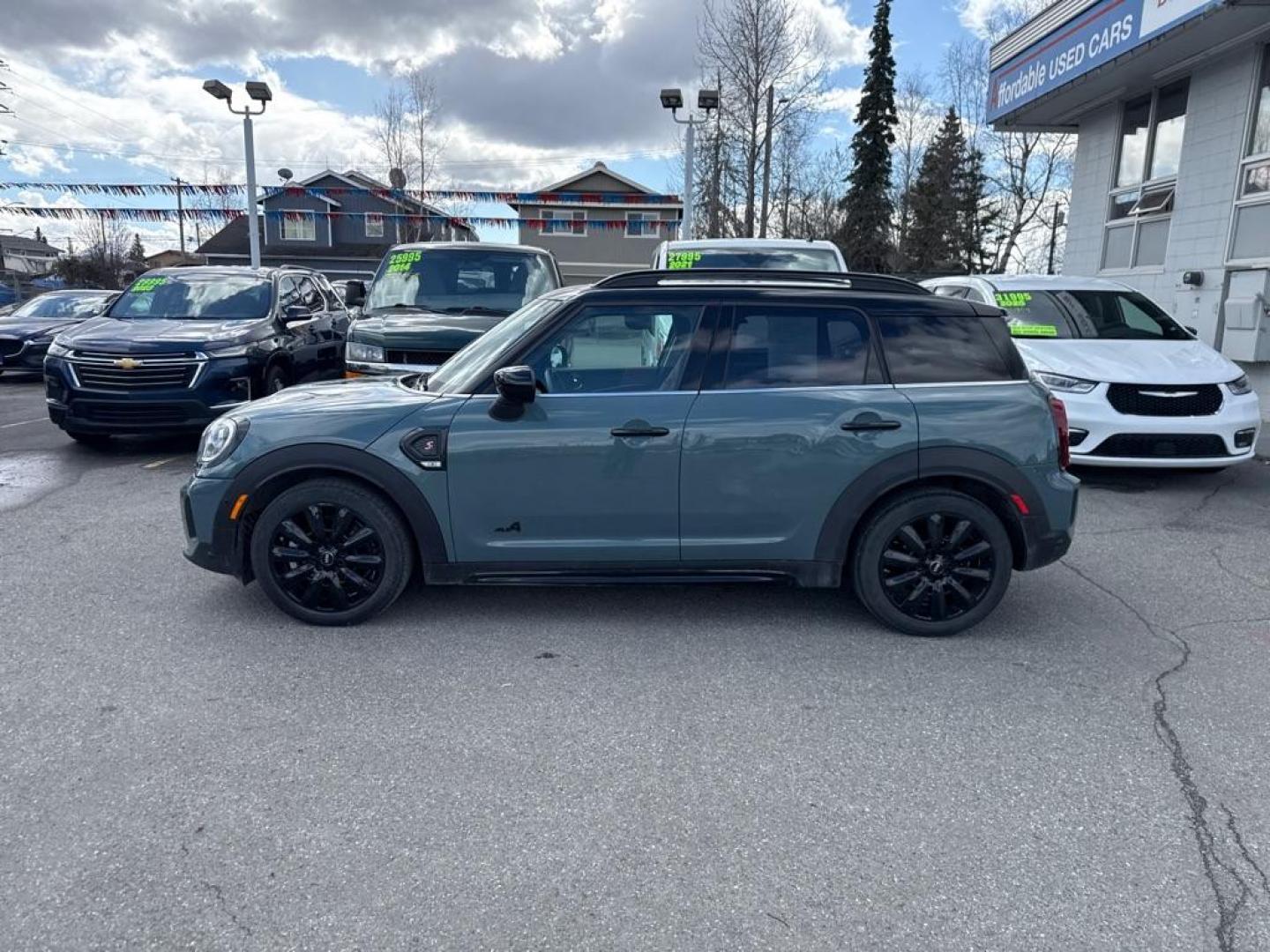 2023 GREEN MINI COOPER S COUNTRYMAN ALL4 (WMZ83BR09P3) with an 2.0L engine, Automatic transmission, located at 929 East 8th Ave, Anchorage, AK, 99501, (907) 274-2277, 61.214783, -149.866074 - Photo#1