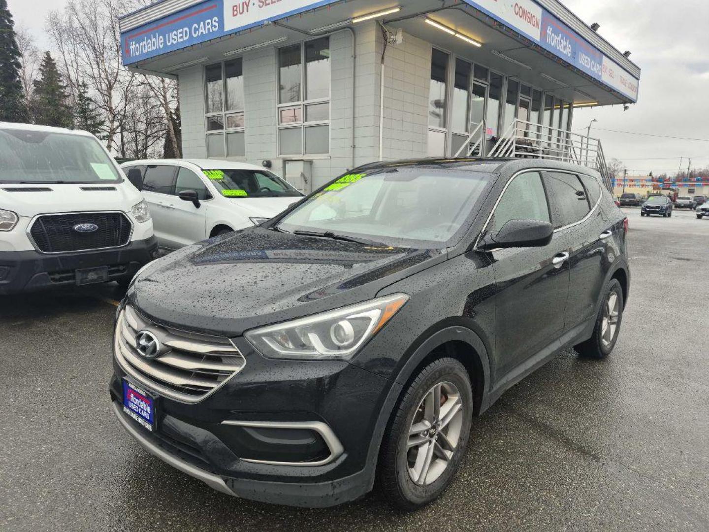 2017 BLACK HYUNDAI SANTA FE SPORT (5NMZTDLB2HH) with an 2.4L engine, Automatic transmission, located at 929 East 8th Ave, Anchorage, AK, 99501, (907) 274-2277, 61.214783, -149.866074 - Photo#0