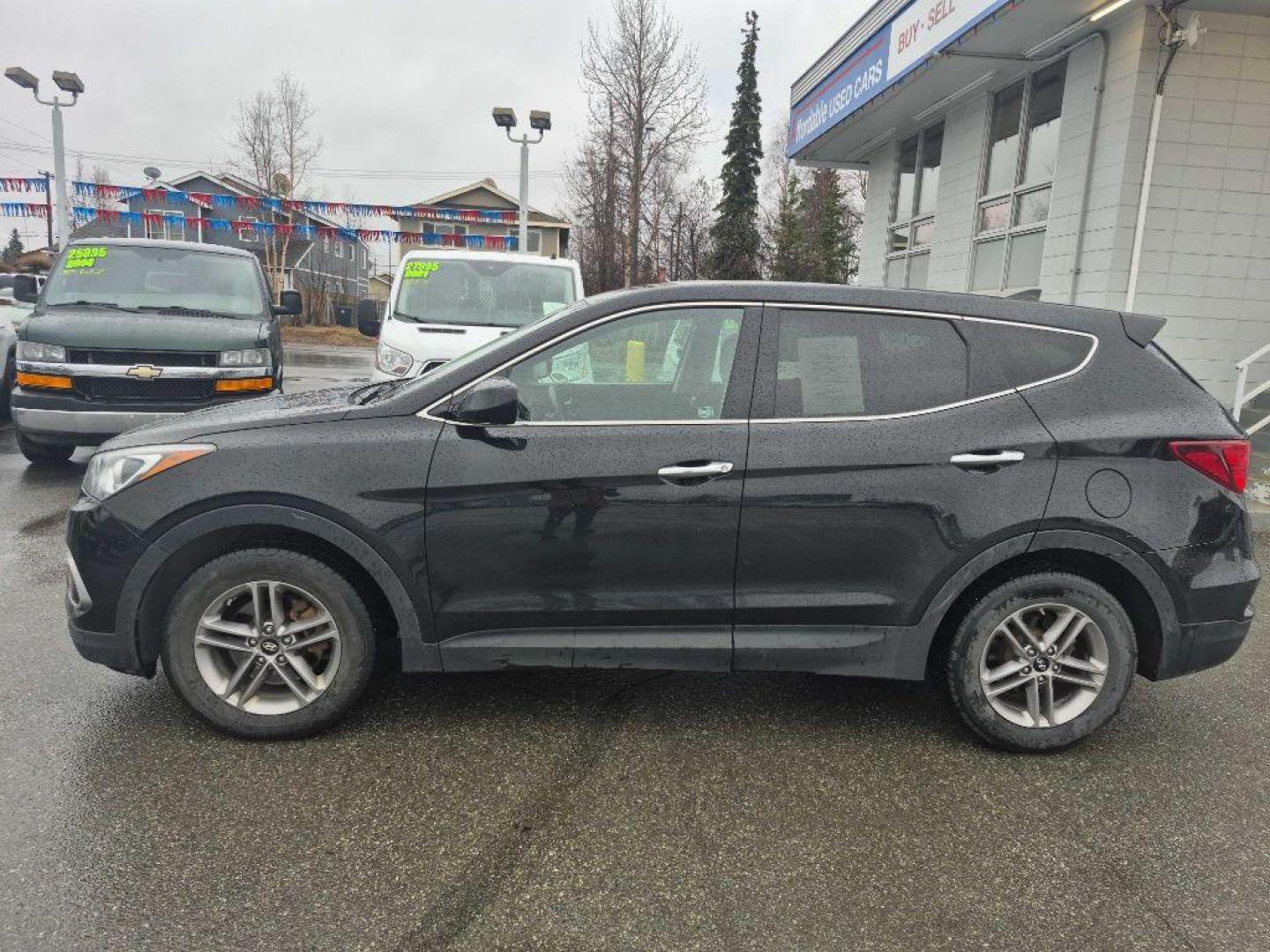 2017 BLACK HYUNDAI SANTA FE SPORT (5NMZTDLB2HH) with an 2.4L engine, Automatic transmission, located at 929 East 8th Ave, Anchorage, AK, 99501, (907) 274-2277, 61.214783, -149.866074 - Photo#1