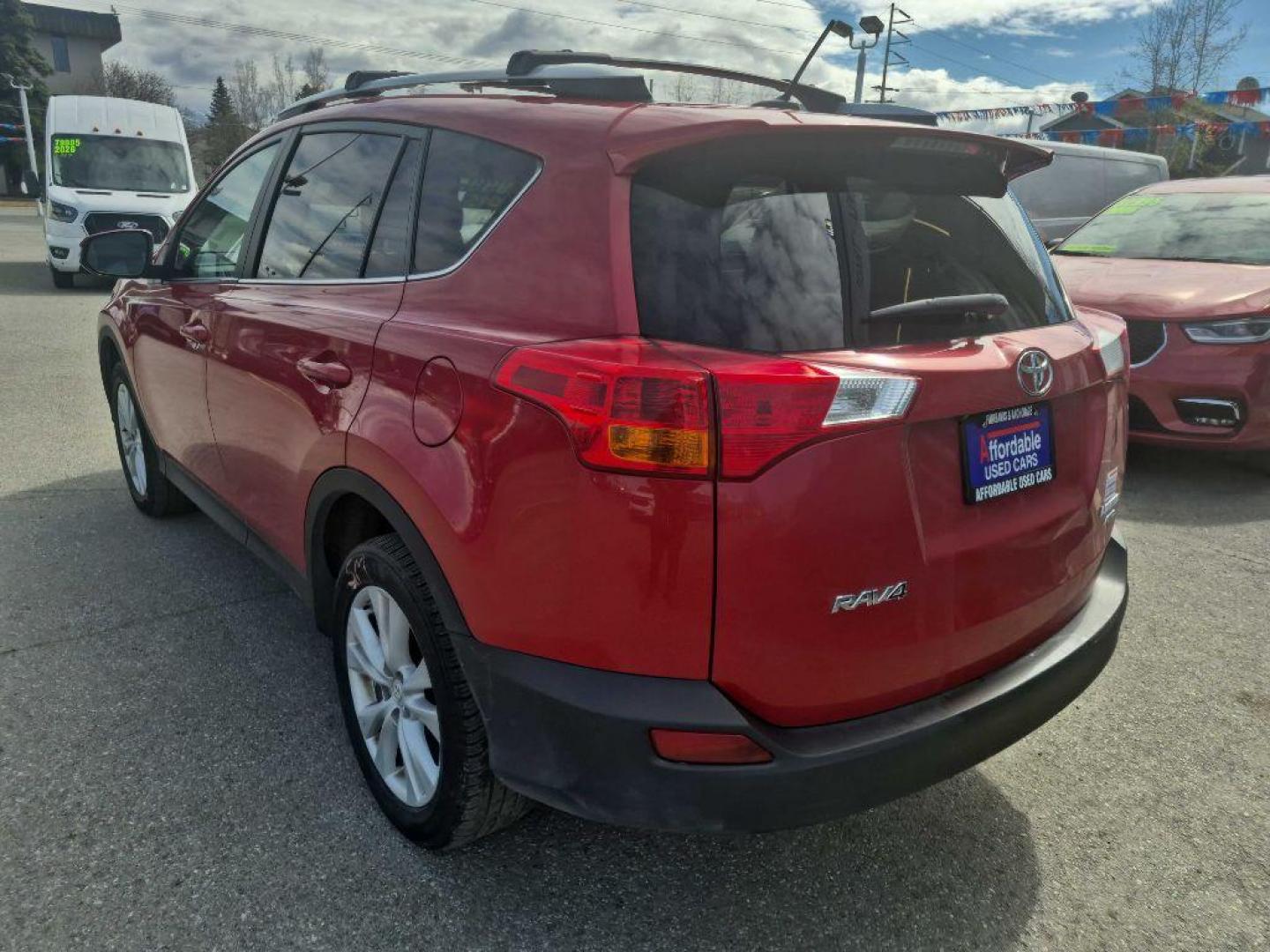 2015 RED TOYOTA RAV4 LIMITED (2T3DFREV0FW) with an 2.5L engine, Automatic transmission, located at 929 East 8th Ave, Anchorage, AK, 99501, (907) 274-2277, 61.214783, -149.866074 - Photo#2