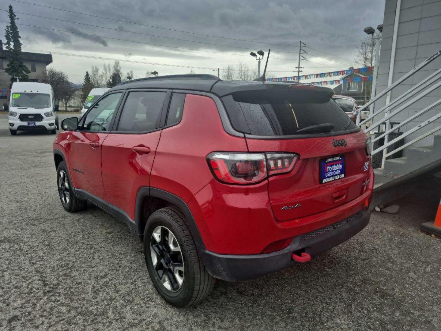 2017 RED JEEP COMPASS TRAILHAWK (3C4NJDDB6HT) with an 2.4L engine, Automatic transmission, located at 929 East 8th Ave, Anchorage, AK, 99501, (907) 274-2277, 61.214783, -149.866074 - Photo#2