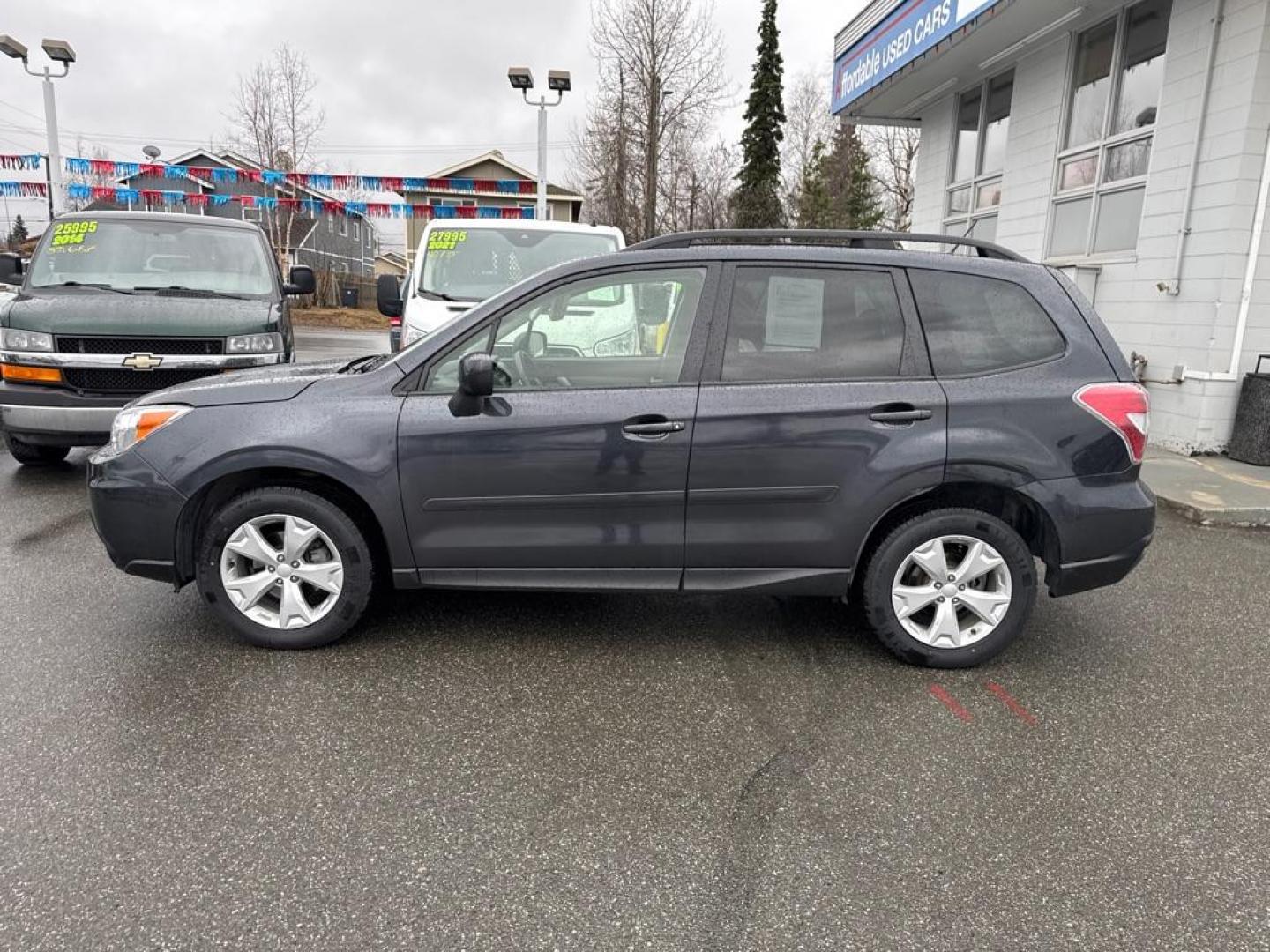 2015 GRAY SUBARU FORESTER 2.5I PREMIUM (JF2SJADC2FH) with an 2.5L engine, 6-Speed Manual transmission, located at 929 East 8th Ave, Anchorage, AK, 99501, (907) 274-2277, 61.214783, -149.866074 - Photo#1