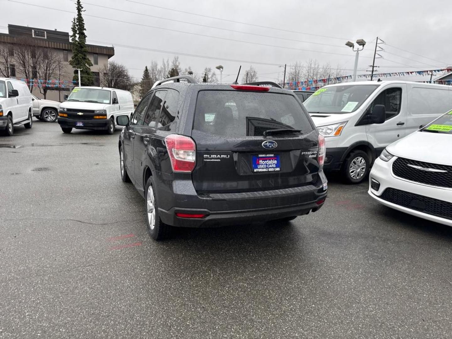 2015 GRAY SUBARU FORESTER 2.5I PREMIUM (JF2SJADC2FH) with an 2.5L engine, 6-Speed Manual transmission, located at 929 East 8th Ave, Anchorage, AK, 99501, (907) 274-2277, 61.214783, -149.866074 - Photo#4