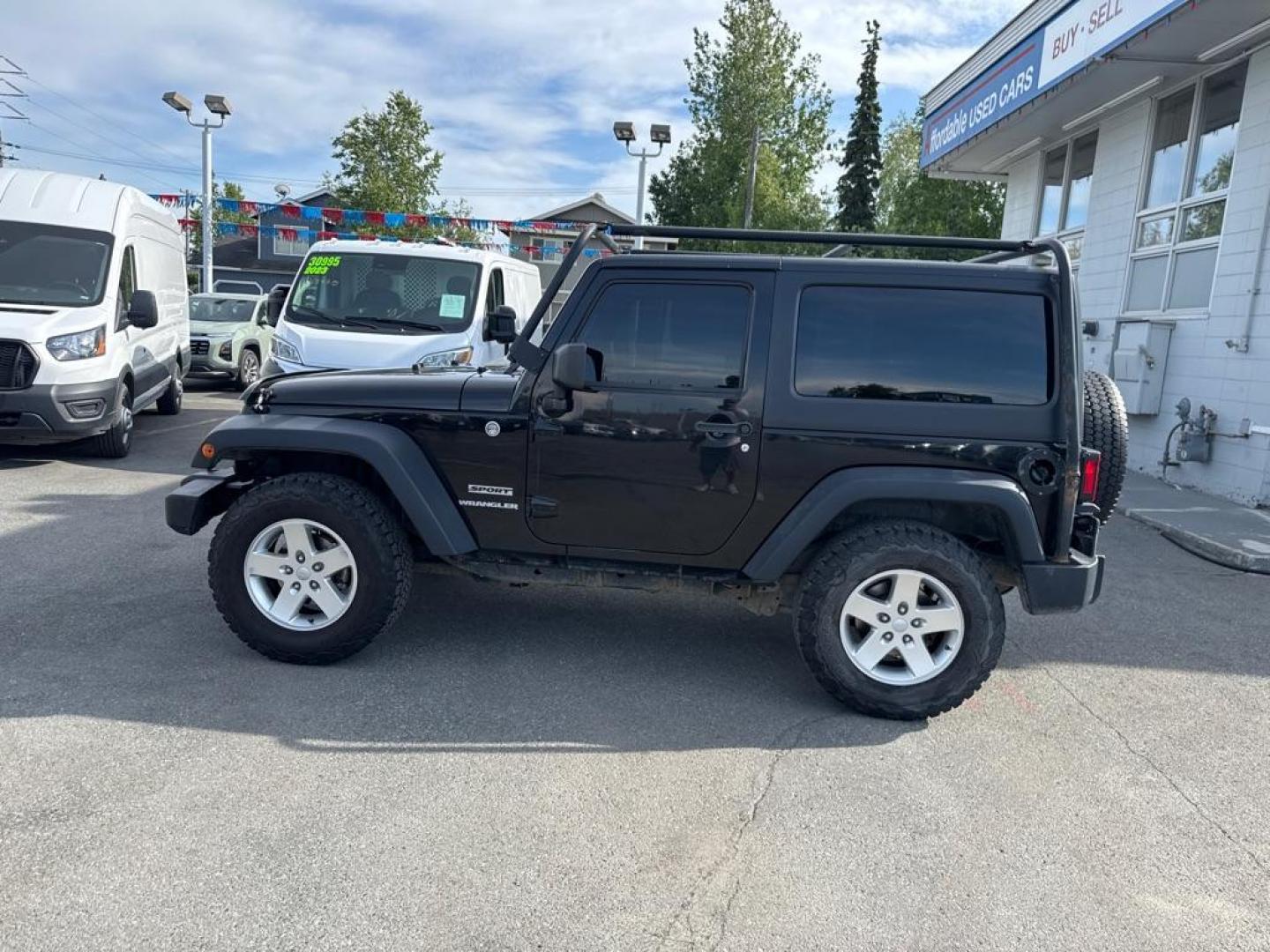 2014 BLACK JEEP WRANGLER SPORT (1C4AJWAG2EL) with an 3.6L engine, Automatic transmission, located at 929 East 8th Ave, Anchorage, AK, 99501, (907) 274-2277, 61.214783, -149.866074 - Photo#1