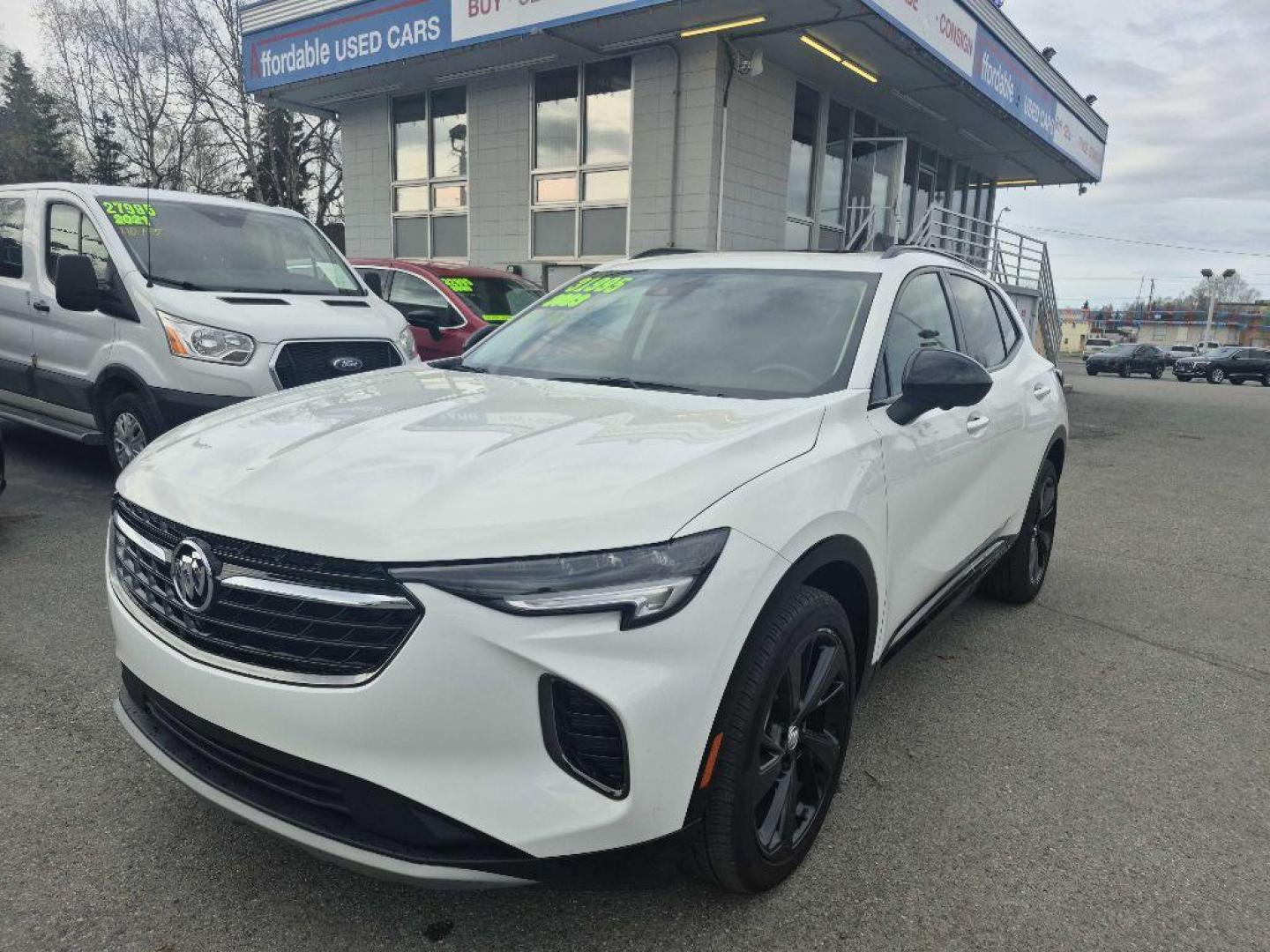 2023 WHITE BUICK ENVISION ESSENCE (LRBFZPR45PD) with an 2.0L engine, Automatic transmission, located at 929 East 8th Ave, Anchorage, AK, 99501, (907) 274-2277, 61.214783, -149.866074 - Photo#0