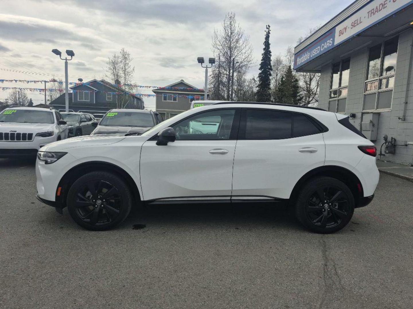 2023 WHITE BUICK ENVISION ESSENCE (LRBFZPR45PD) with an 2.0L engine, Automatic transmission, located at 929 East 8th Ave, Anchorage, AK, 99501, (907) 274-2277, 61.214783, -149.866074 - Photo#1