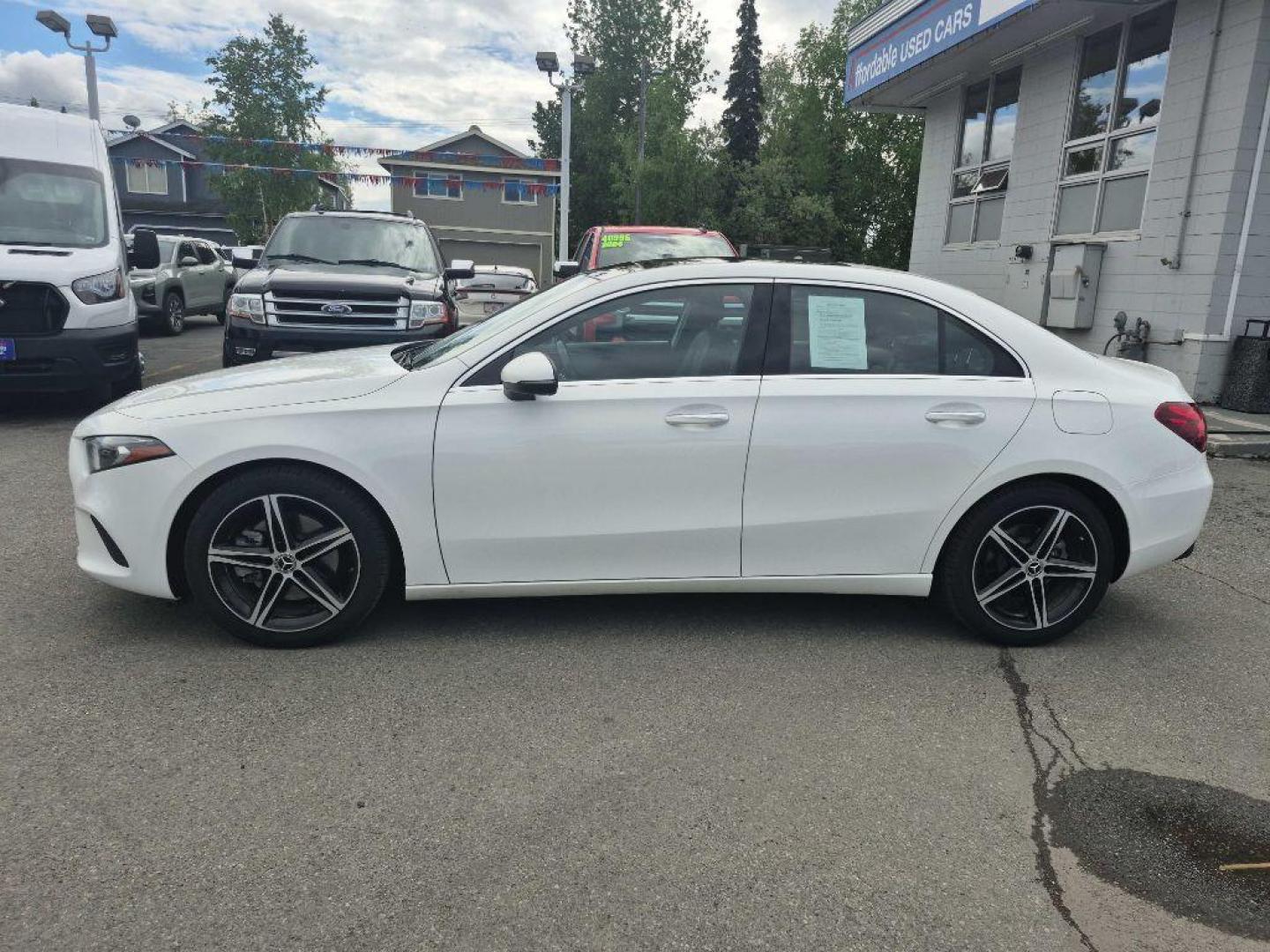 2021 WHITE MERCEDES-BENZ A220 4MATIC (W1K3G4FB0MJ) with an 2.0L engine, Automatic transmission, located at 929 East 8th Ave, Anchorage, AK, 99501, (907) 274-2277, 61.214783, -149.866074 - Photo#1