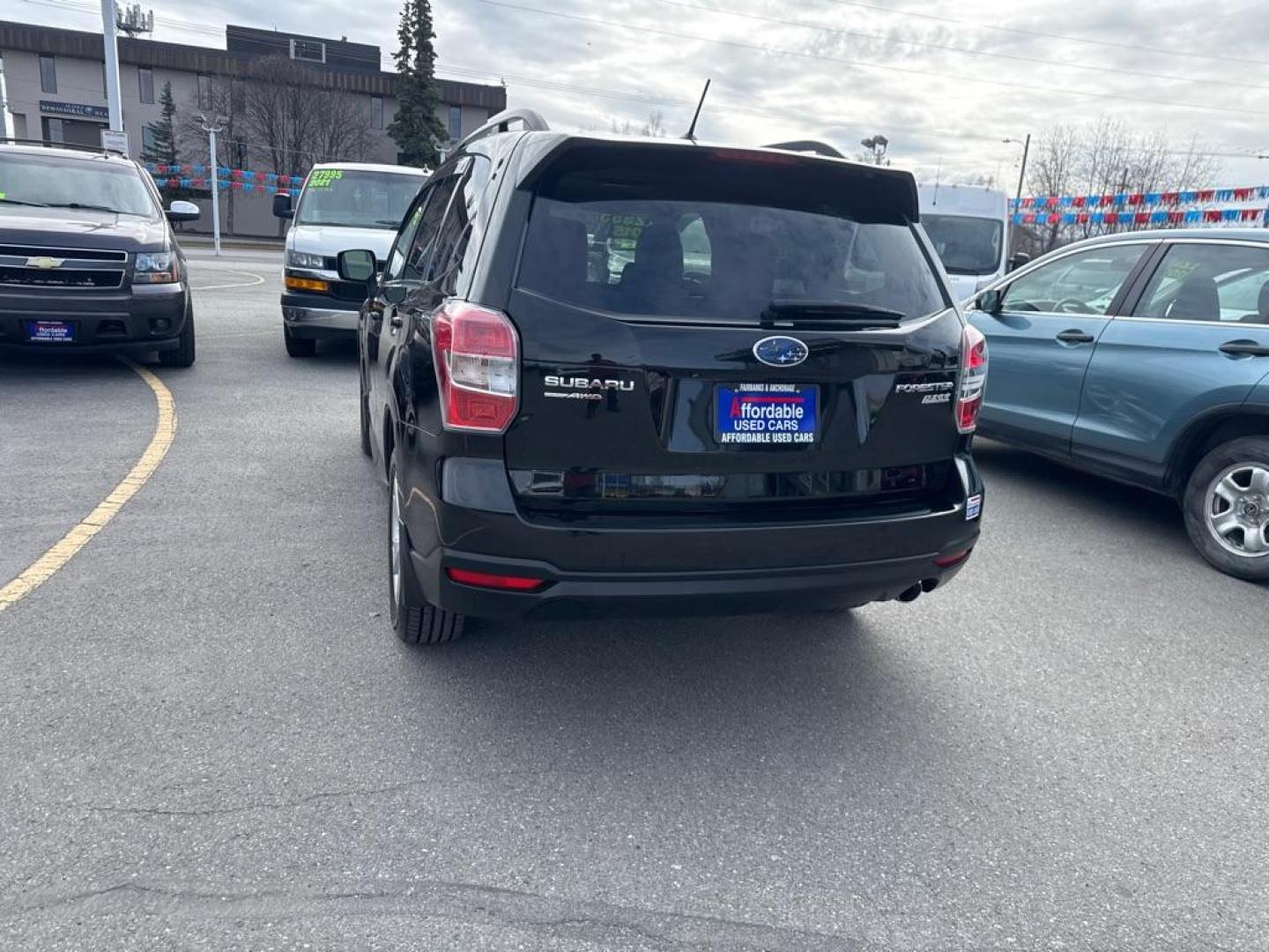 2015 SUBARU FORESTER 2.5I LIMITED (JF2SJAHC8FH) with an 2.5L engine, Continuously Variable transmission, located at 929 East 8th Ave, Anchorage, AK, 99501, (907) 274-2277, 61.214783, -149.866074 - Photo#4