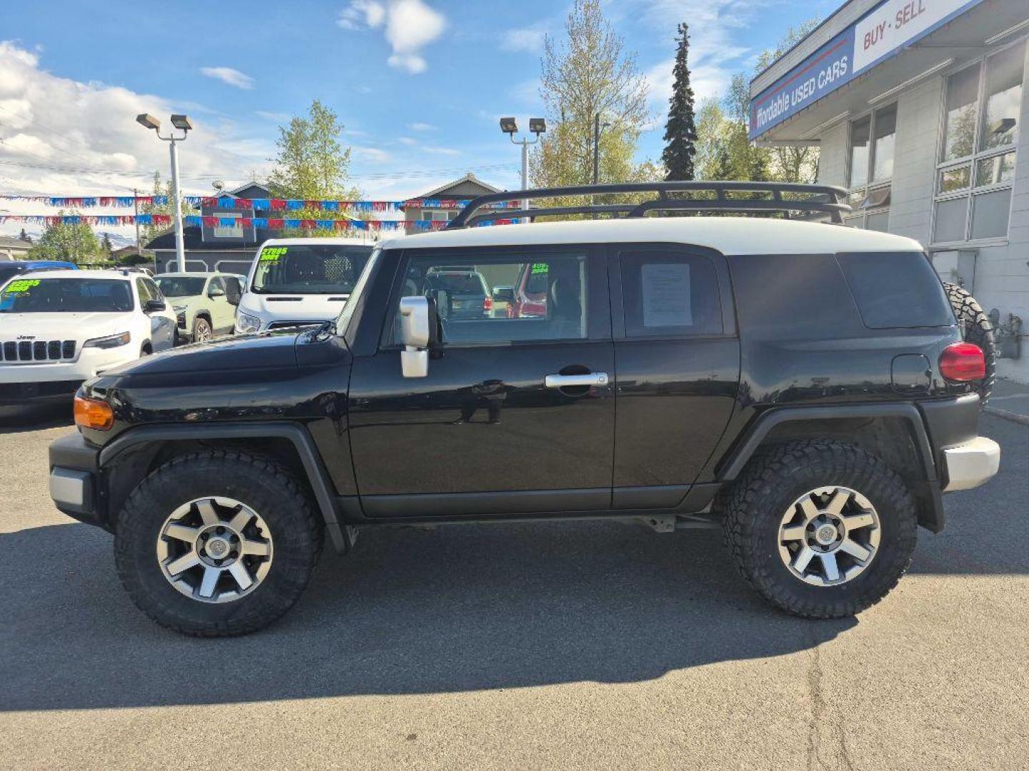 2014 BLACK TOYOTA FJ CRUISER (JTEBU4BF2EK) with an 4.0L engine, Automatic transmission, located at 929 East 8th Ave, Anchorage, AK, 99501, (907) 274-2277, 61.214783, -149.866074 - Photo#1