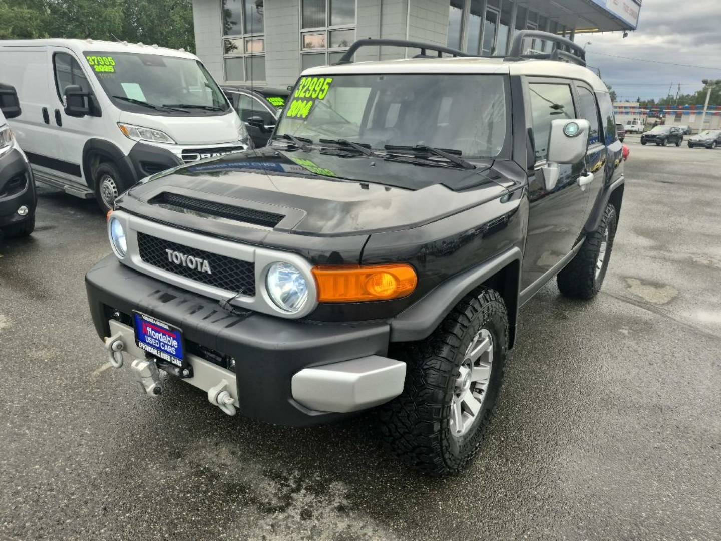 2014 BLACK TOYOTA FJ CRUISER (JTEBU4BF2EK) with an 4.0L engine, Automatic transmission, located at 929 East 8th Ave, Anchorage, AK, 99501, (907) 274-2277, 61.214783, -149.866074- Photo#0
