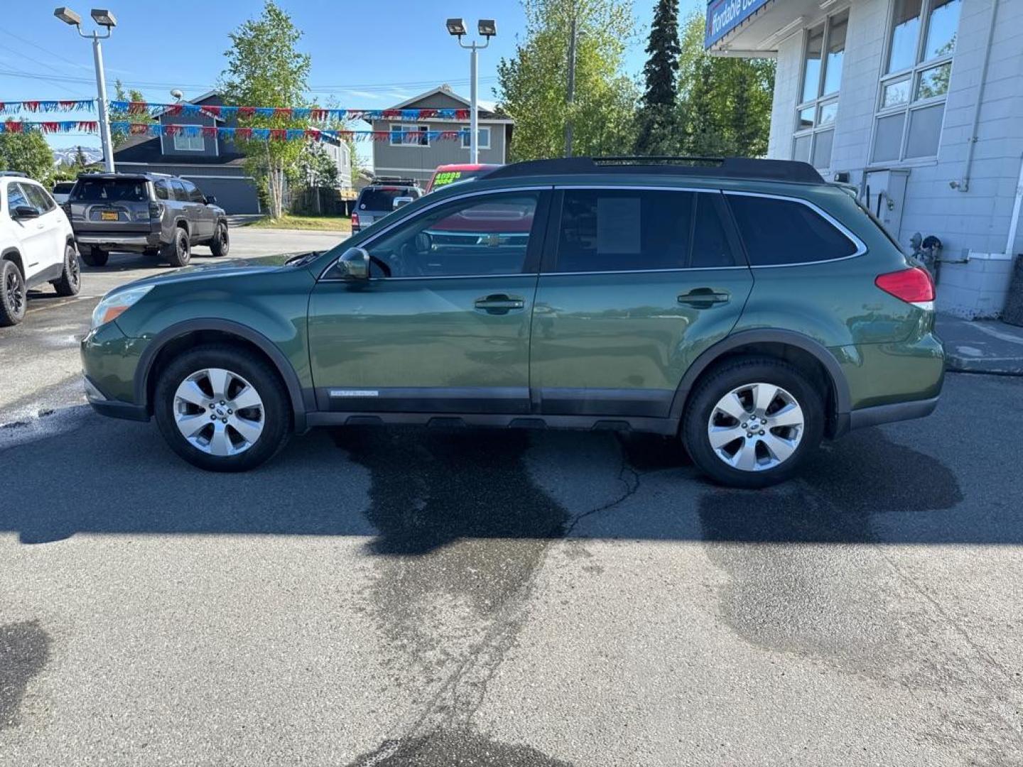 2012 GREEN SUBARU OUTBACK 2.5I LIMITED (4S4BRCKC5C3) with an 2.5L engine, Continuously Variable transmission, located at 929 East 8th Ave, Anchorage, AK, 99501, (907) 274-2277, 61.214783, -149.866074 - Photo#1
