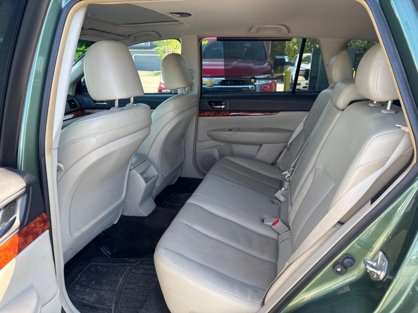 2012 GREEN SUBARU OUTBACK 2.5I LIMITED (4S4BRCKC5C3) with an 2.5L engine, Continuously Variable transmission, located at 929 East 8th Ave, Anchorage, AK, 99501, (907) 274-2277, 61.214783, -149.866074 - Photo#2