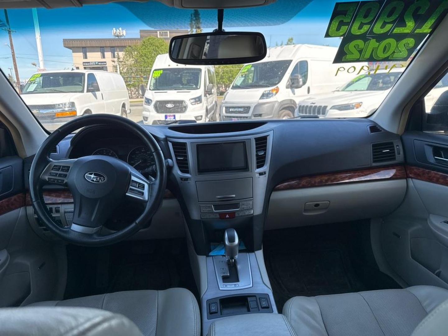 2012 GREEN SUBARU OUTBACK 2.5I LIMITED (4S4BRCKC5C3) with an 2.5L engine, Continuously Variable transmission, located at 929 East 8th Ave, Anchorage, AK, 99501, (907) 274-2277, 61.214783, -149.866074 - Photo#3