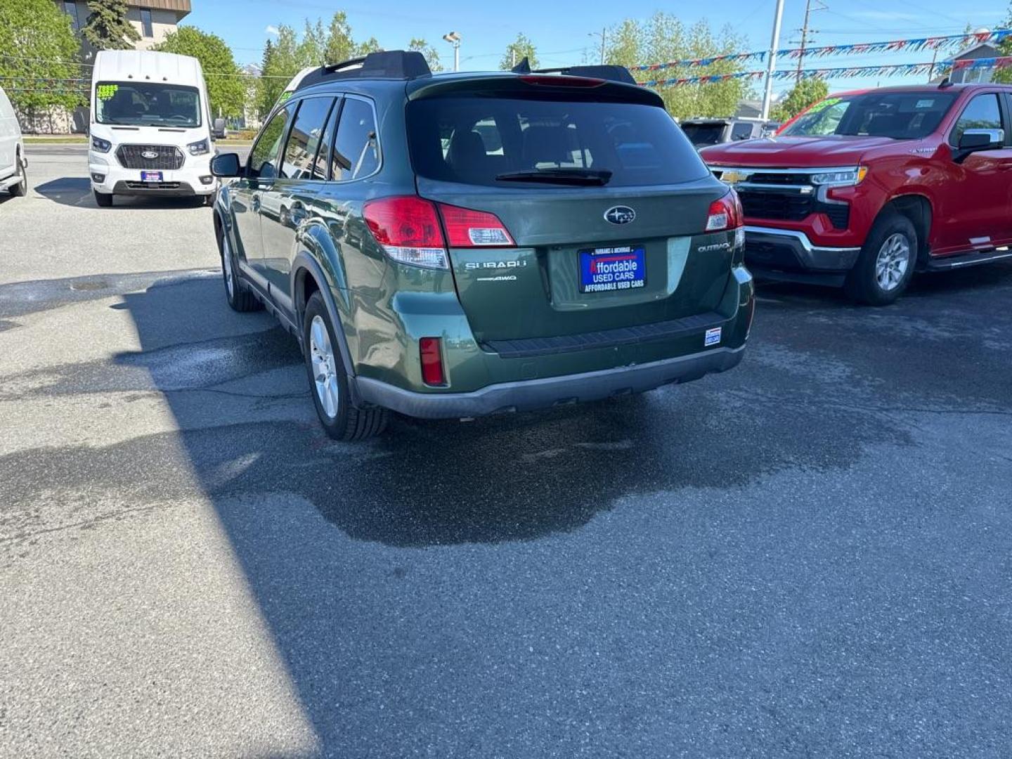 2012 GREEN SUBARU OUTBACK 2.5I LIMITED (4S4BRCKC5C3) with an 2.5L engine, Continuously Variable transmission, located at 929 East 8th Ave, Anchorage, AK, 99501, (907) 274-2277, 61.214783, -149.866074 - Photo#4