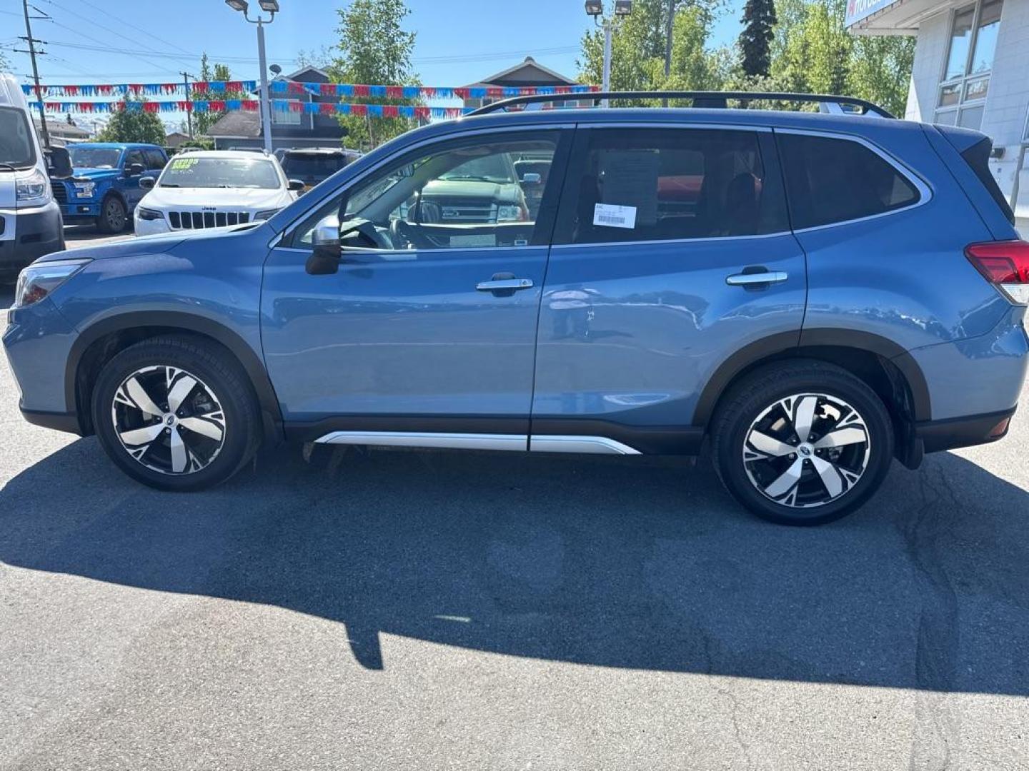 2019 BLUE SUBARU FORESTER TOURING (JF2SKAWC0KH) with an 2.5L engine, Continuously Variable transmission, located at 929 East 8th Ave, Anchorage, AK, 99501, (907) 274-2277, 61.214783, -149.866074 - Photo#1