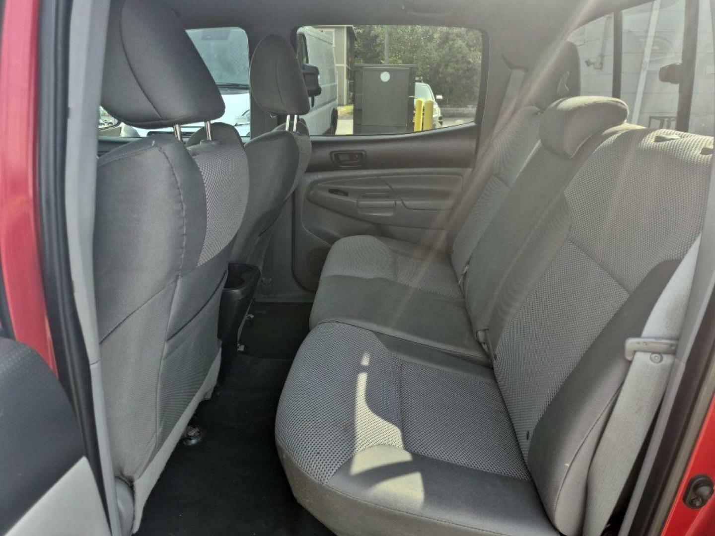 2015 RED TOYOTA TACOMA DOUBLE CAB (3TMLU4EN6FM) with an 4.0L engine, Automatic transmission, located at 929 East 8th Ave, Anchorage, AK, 99501, (907) 274-2277, 61.214783, -149.866074 - Photo#3