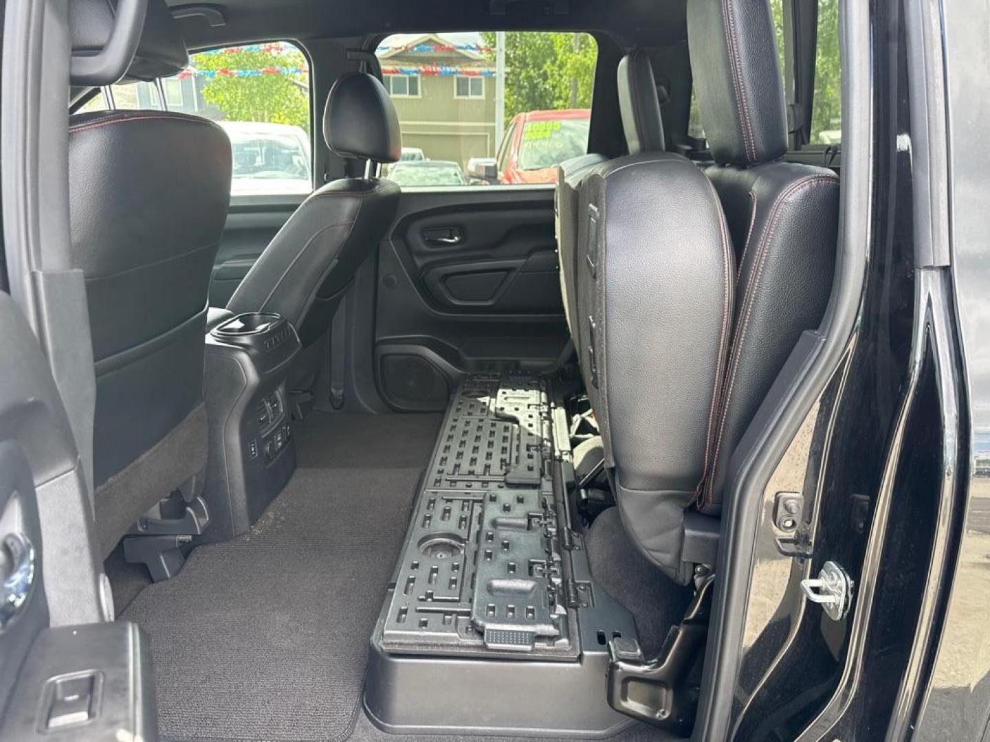 2021 BLACK NISSAN TITAN PRO4X (1N6AA1ED0MN) with an 5.6L engine, Automatic transmission, located at 929 East 8th Ave, Anchorage, AK, 99501, (907) 274-2277, 61.214783, -149.866074 - Photo#2