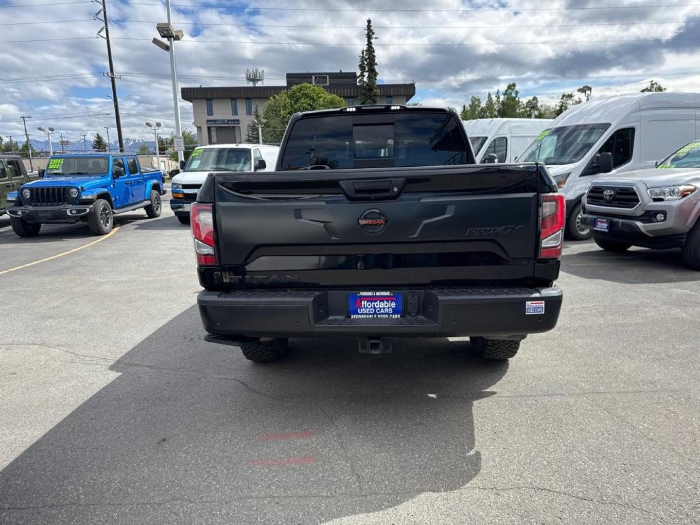 2021 BLACK NISSAN TITAN PRO4X (1N6AA1ED0MN) with an 5.6L engine, Automatic transmission, located at 929 East 8th Ave, Anchorage, AK, 99501, (907) 274-2277, 61.214783, -149.866074 - Photo#4