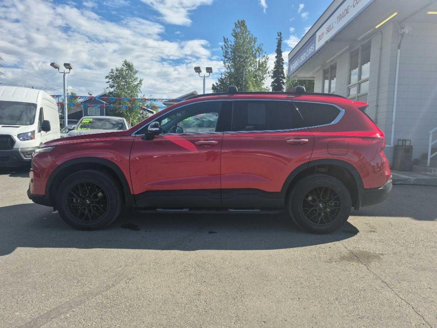 2023 RED HYUNDAI SANTA FE XRT (5NMS6DAJ4PH) with an 2.5L engine, Automatic transmission, located at 929 East 8th Ave, Anchorage, AK, 99501, (907) 274-2277, 61.214783, -149.866074 - Photo#1