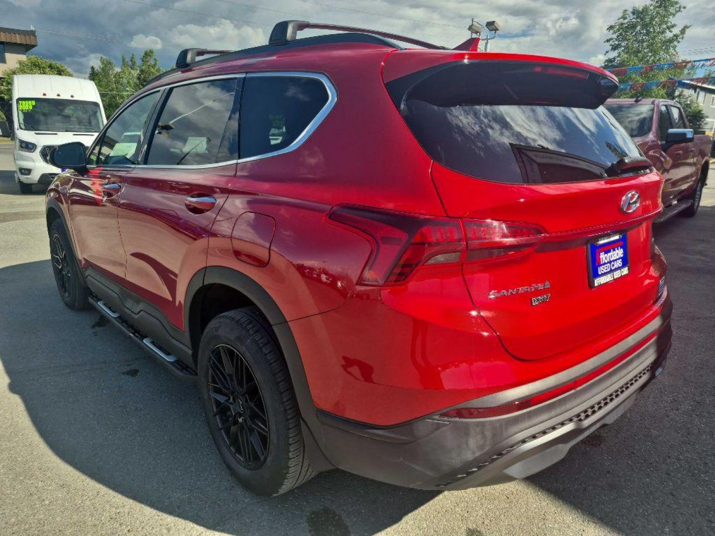 2023 RED HYUNDAI SANTA FE XRT (5NMS6DAJ4PH) with an 2.5L engine, Automatic transmission, located at 929 East 8th Ave, Anchorage, AK, 99501, (907) 274-2277, 61.214783, -149.866074 - Photo#2