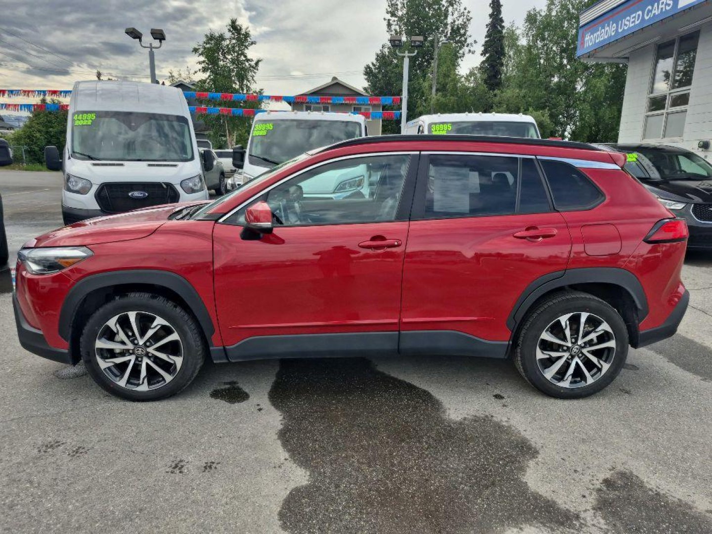 2024 RED TOYOTA COROLLA CROSS XLE (7MUEAABG0RV) with an 2.0L engine, Continuously Variable transmission, located at 929 East 8th Ave, Anchorage, AK, 99501, (907) 274-2277, 61.214783, -149.866074- Photo#1