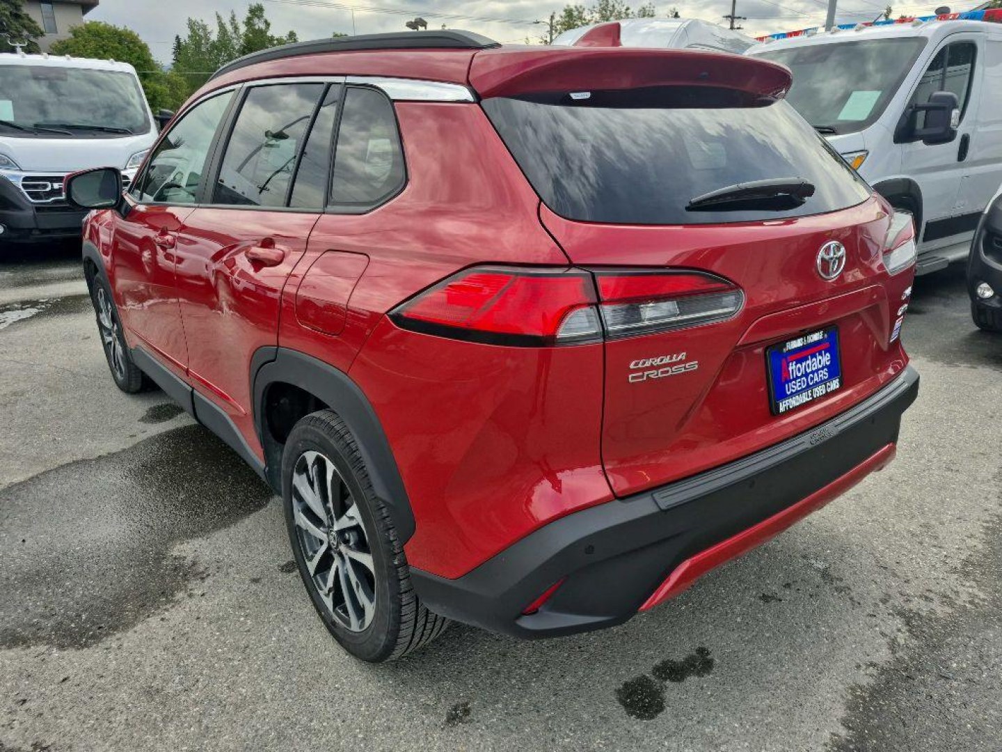 2024 RED TOYOTA COROLLA CROSS XLE (7MUEAABG0RV) with an 2.0L engine, Continuously Variable transmission, located at 929 East 8th Ave, Anchorage, AK, 99501, (907) 274-2277, 61.214783, -149.866074- Photo#2