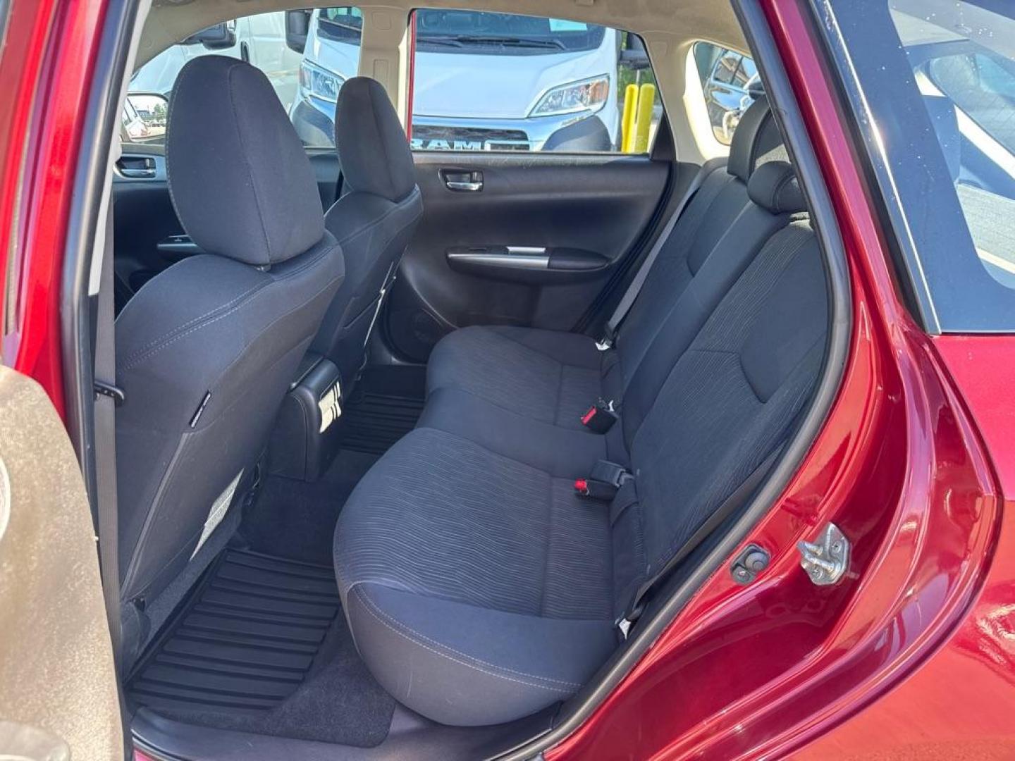 2011 MAROON SUBARU IMPREZA OUTBACK SPORT (JF1GH6D60BG) with an 2.5L engine, 4-Speed Manual transmission, located at 929 East 8th Ave, Anchorage, AK, 99501, (907) 274-2277, 61.214783, -149.866074 - Photo#2