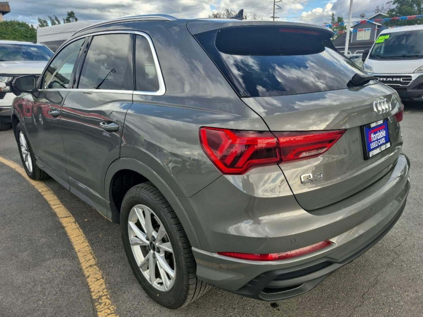2025 RED AUDI Q3 PREMIUM S LINE 45 (WA1DECF34S1) with an 2.0L engine, Automatic transmission, located at 929 East 8th Ave, Anchorage, AK, 99501, (907) 274-2277, 61.214783, -149.866074- Photo#3