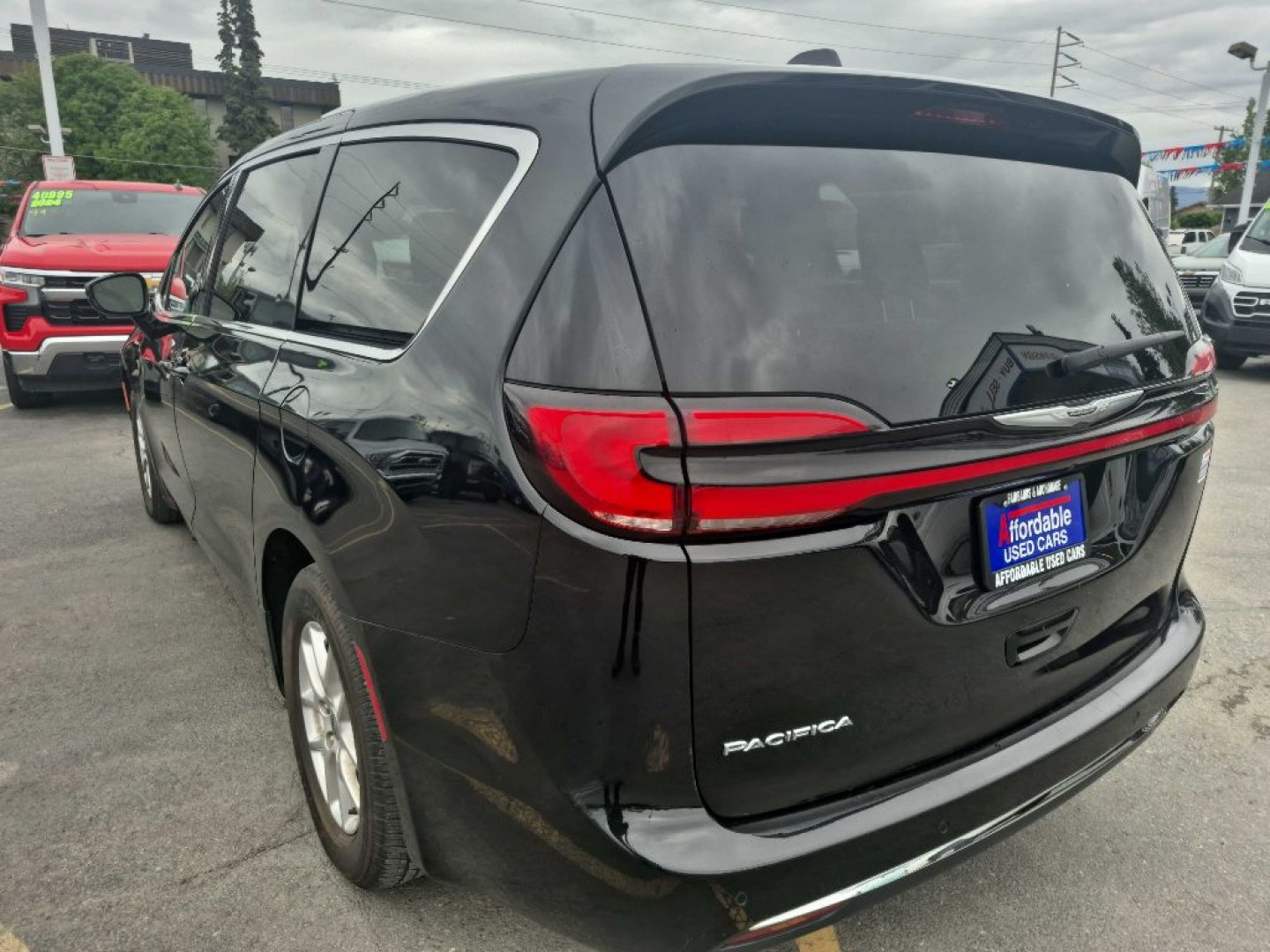 2024 BLACK CHRYSLER PACIFICA TOURING L (2C4RC1BG9RR) with an 3.6L engine, Automatic transmission, located at 929 East 8th Ave, Anchorage, AK, 99501, (907) 274-2277, 61.214783, -149.866074- Photo#2