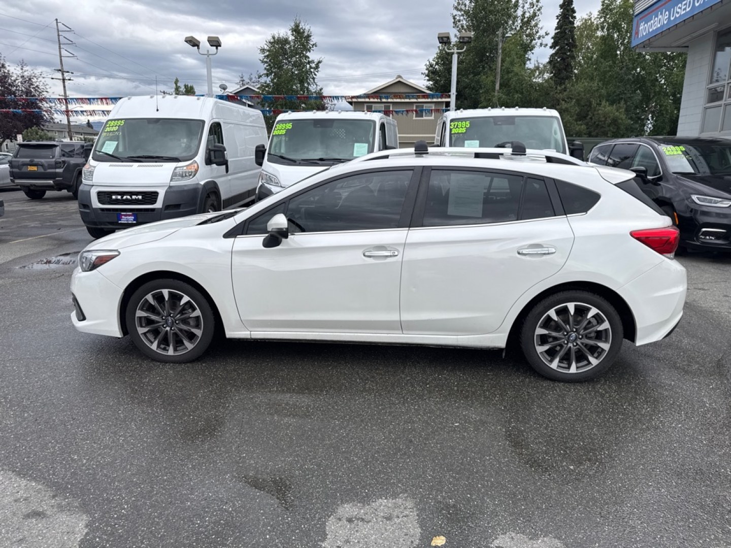 2021 WHITE SUBARU IMPREZA LIMITED (4S3GTAT67M3) with an 2.0L engine, Continuously Variable transmission, located at 929 East 8th Ave, Anchorage, AK, 99501, (907) 274-2277, 61.214783, -149.866074- Photo#1