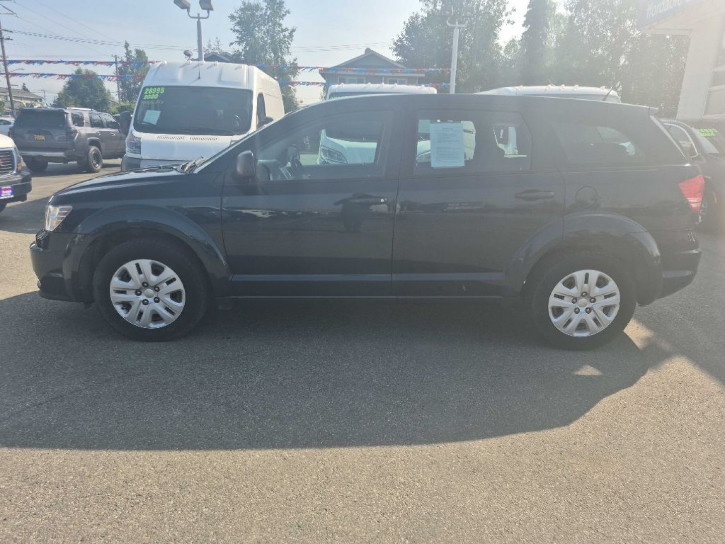 2015 BLACK DODGE JOURNEY SE (3C4PDCAB9FT) with an 2.4L engine, Automatic transmission, located at 929 East 8th Ave, Anchorage, AK, 99501, (907) 274-2277, 61.214783, -149.866074- Photo#1