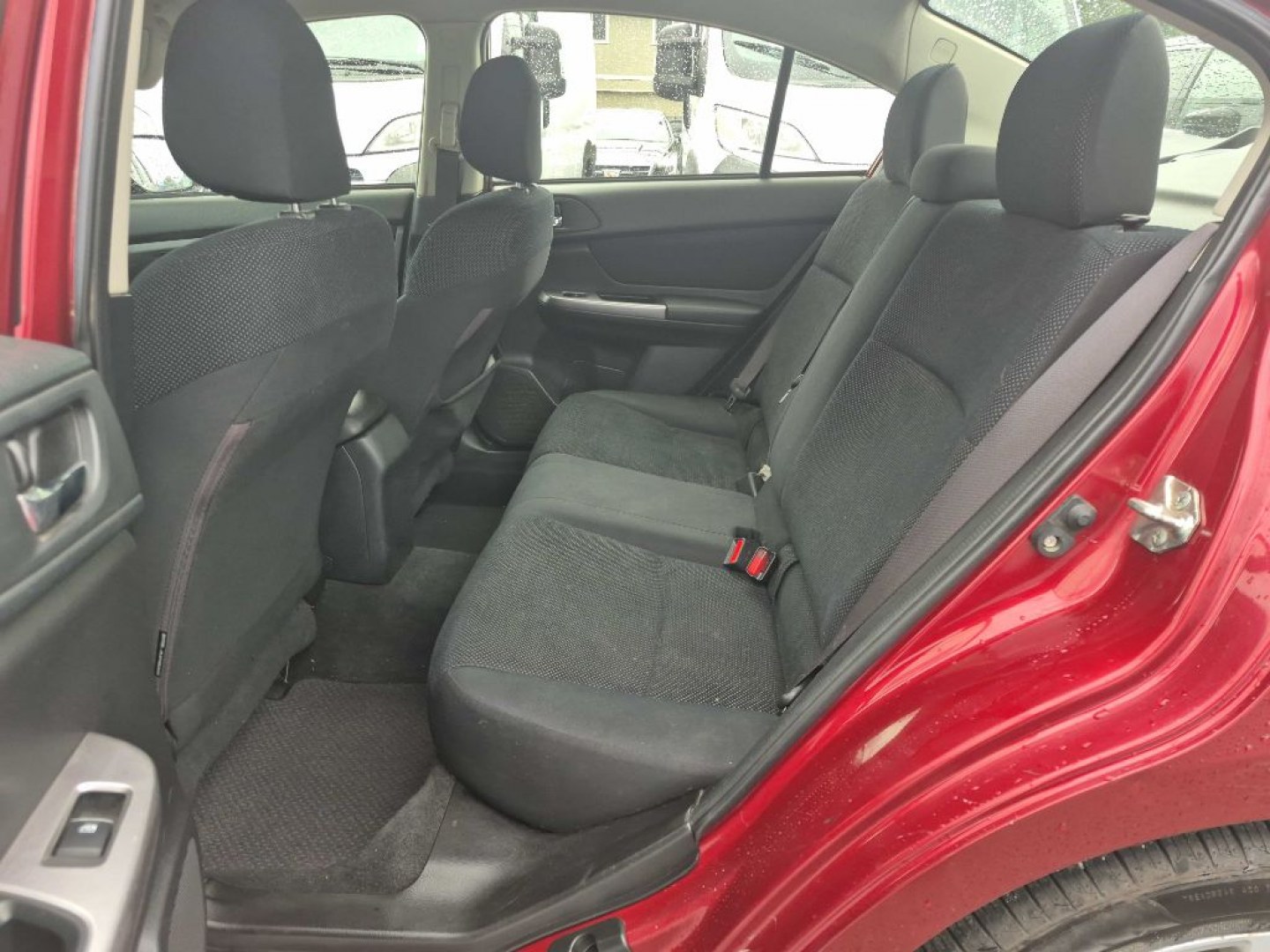 2016 RED SUBARU IMPREZA PREMIUM (JF1GJAB61GH) with an 2.0L engine, Continuously Variable transmission, located at 929 East 8th Ave, Anchorage, AK, 99501, (907) 274-2277, 61.214783, -149.866074- Photo#3