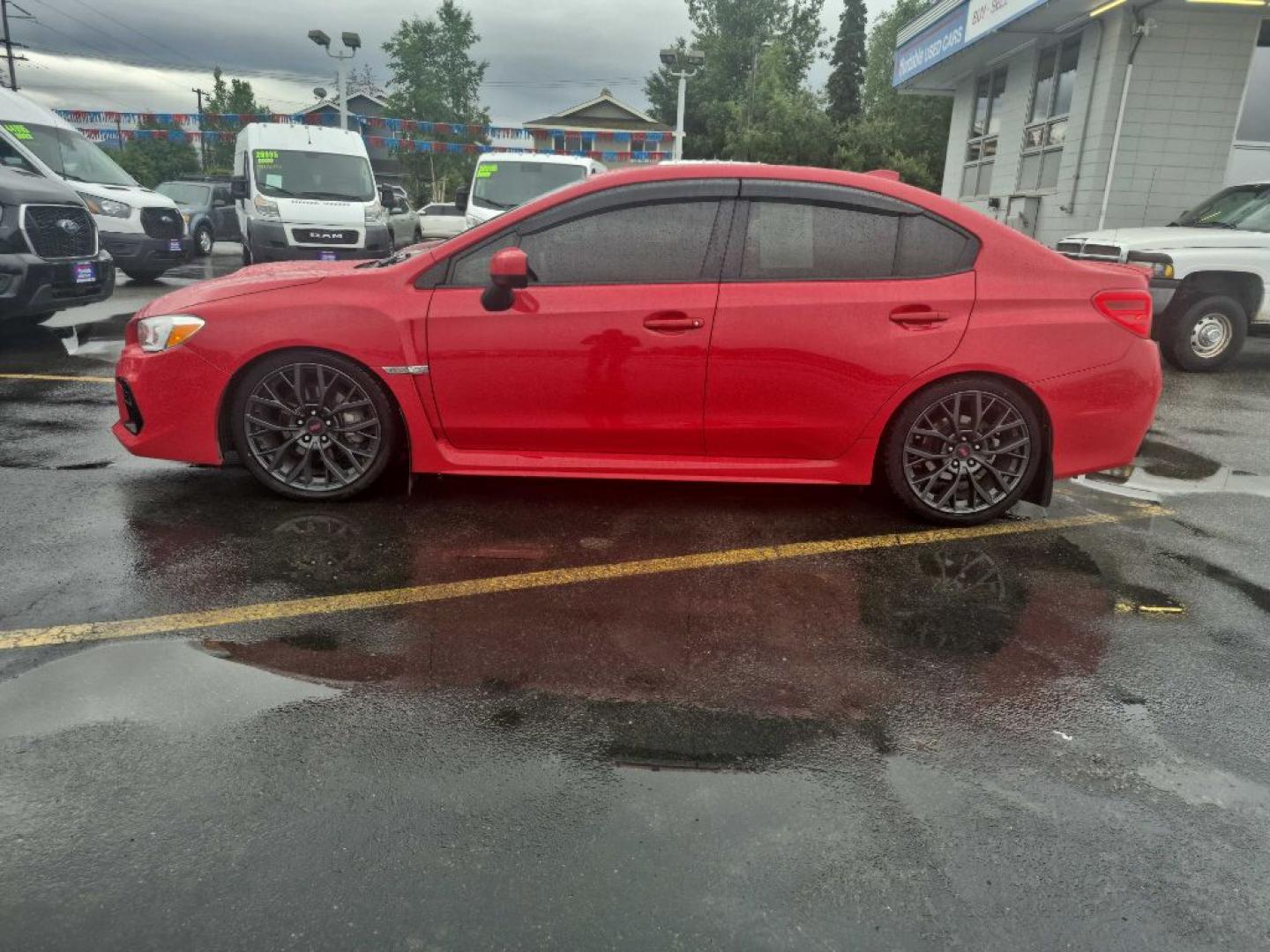 2021 RED SUBARU WRX PREMIUM (JF1VA1C64M9) with an 2.0L engine, Continuously Variable transmission, located at 929 East 8th Ave, Anchorage, AK, 99501, (907) 274-2277, 61.214783, -149.866074- Photo#1